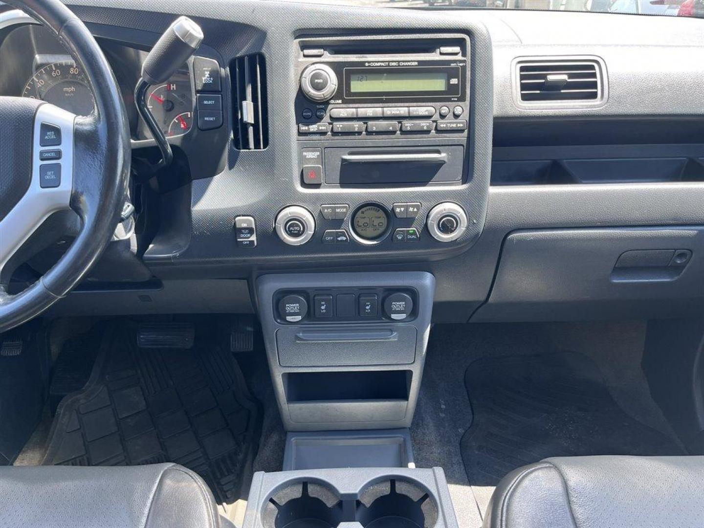 2007 Black /Grey Honda Ridgeline (2HJYK16567H) with an 3.5l V6 MPI Sohc Vtec 3.5 engine, Automatic transmission, located at 745 East Steele Rd., West Columbia, SC, 29170, (803) 755-9148, 33.927212, -81.148483 - Special Internet Price! 2007 Honda Ridgeline RTL with AM/FM radio, Remote keyless entry, Cruise control, Dual-zone automatic climate control, Leather interior, 60/40 split fold rear seat, Powered windows, Powered door locks, Plus more! - Photo#9