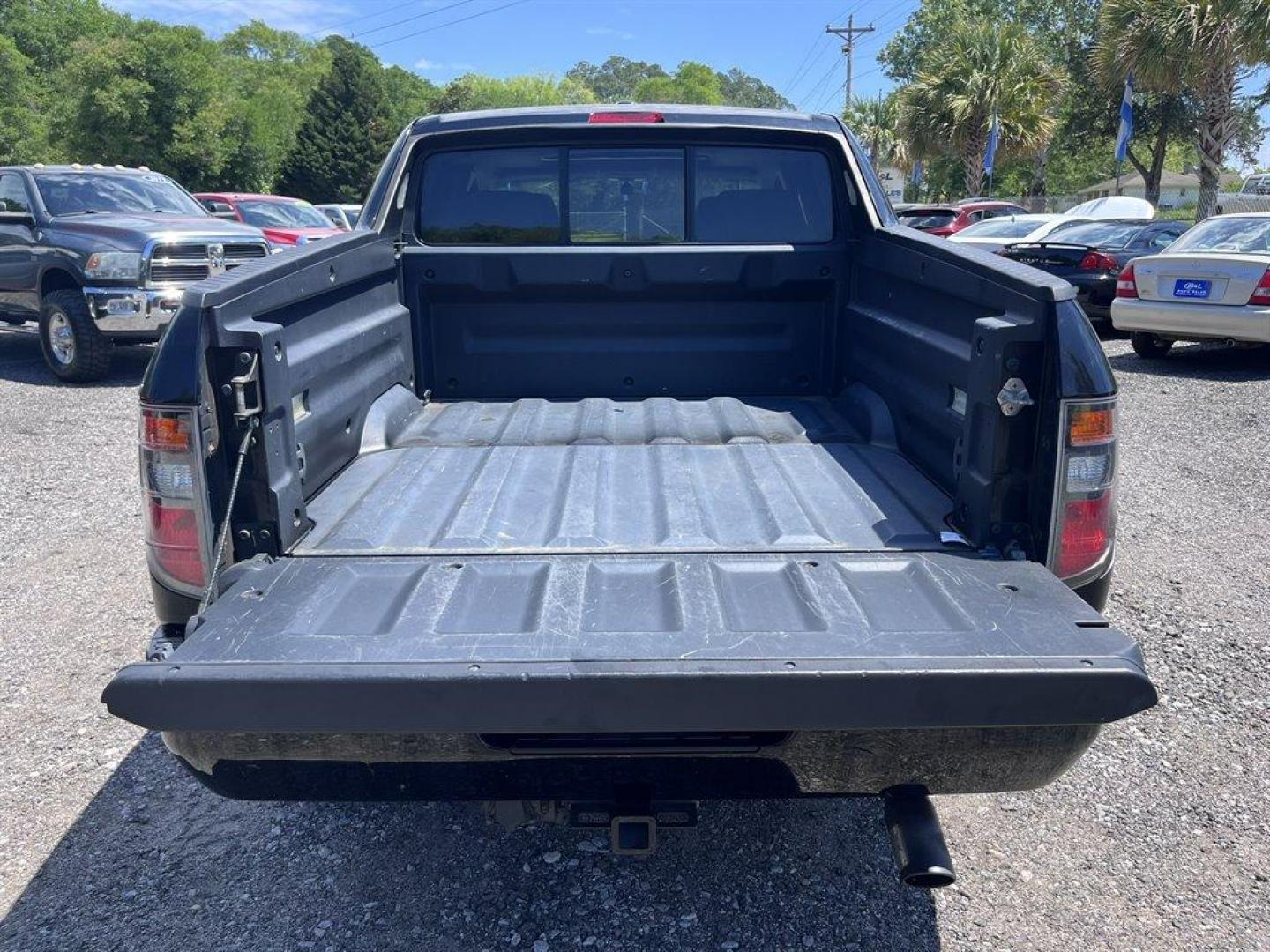 2007 Black /Grey Honda Ridgeline (2HJYK16567H) with an 3.5l V6 MPI Sohc Vtec 3.5 engine, Automatic transmission, located at 745 East Steele Rd., West Columbia, SC, 29170, (803) 755-9148, 33.927212, -81.148483 - Special Internet Price! 2007 Honda Ridgeline RTL with AM/FM radio, Remote keyless entry, Cruise control, Dual-zone automatic climate control, Leather interior, 60/40 split fold rear seat, Powered windows, Powered door locks, Plus more! - Photo#28