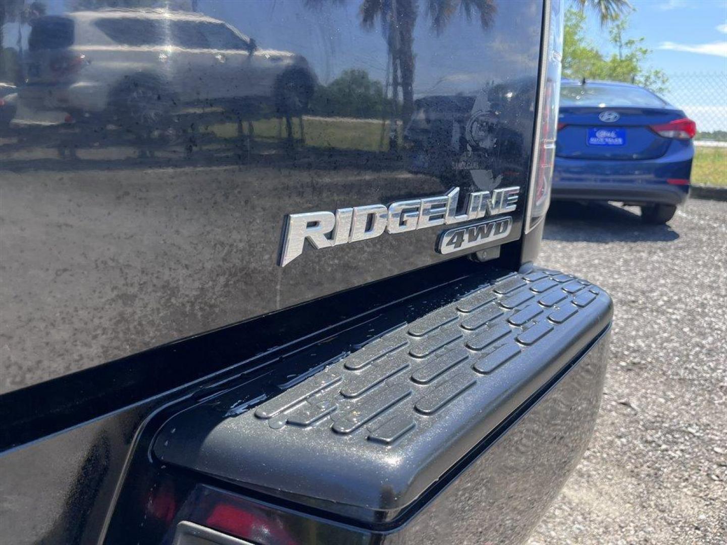 2007 Black /Grey Honda Ridgeline (2HJYK16567H) with an 3.5l V6 MPI Sohc Vtec 3.5 engine, Automatic transmission, located at 745 East Steele Rd., West Columbia, SC, 29170, (803) 755-9148, 33.927212, -81.148483 - Special Internet Price! 2007 Honda Ridgeline RTL with AM/FM radio, Remote keyless entry, Cruise control, Dual-zone automatic climate control, Leather interior, 60/40 split fold rear seat, Powered windows, Powered door locks, Plus more! - Photo#29