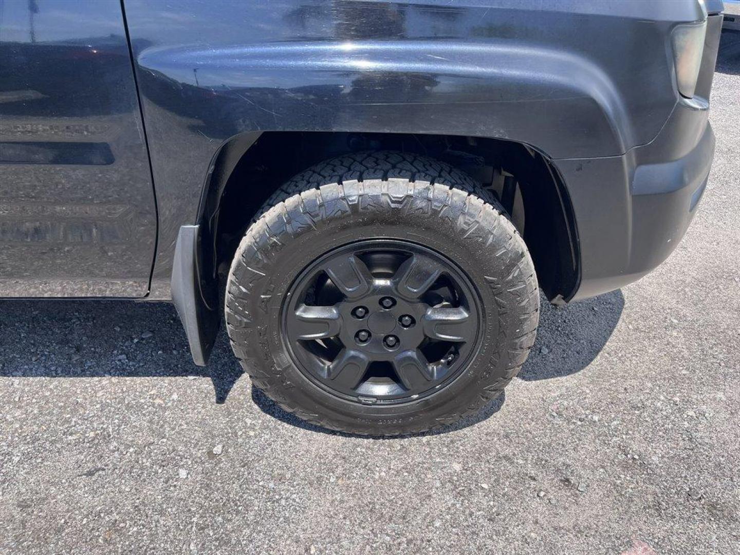 2007 Black /Grey Honda Ridgeline (2HJYK16567H) with an 3.5l V6 MPI Sohc Vtec 3.5 engine, Automatic transmission, located at 745 East Steele Rd., West Columbia, SC, 29170, (803) 755-9148, 33.927212, -81.148483 - Special Internet Price! 2007 Honda Ridgeline RTL with AM/FM radio, Remote keyless entry, Cruise control, Dual-zone automatic climate control, Leather interior, 60/40 split fold rear seat, Powered windows, Powered door locks, Plus more! - Photo#30