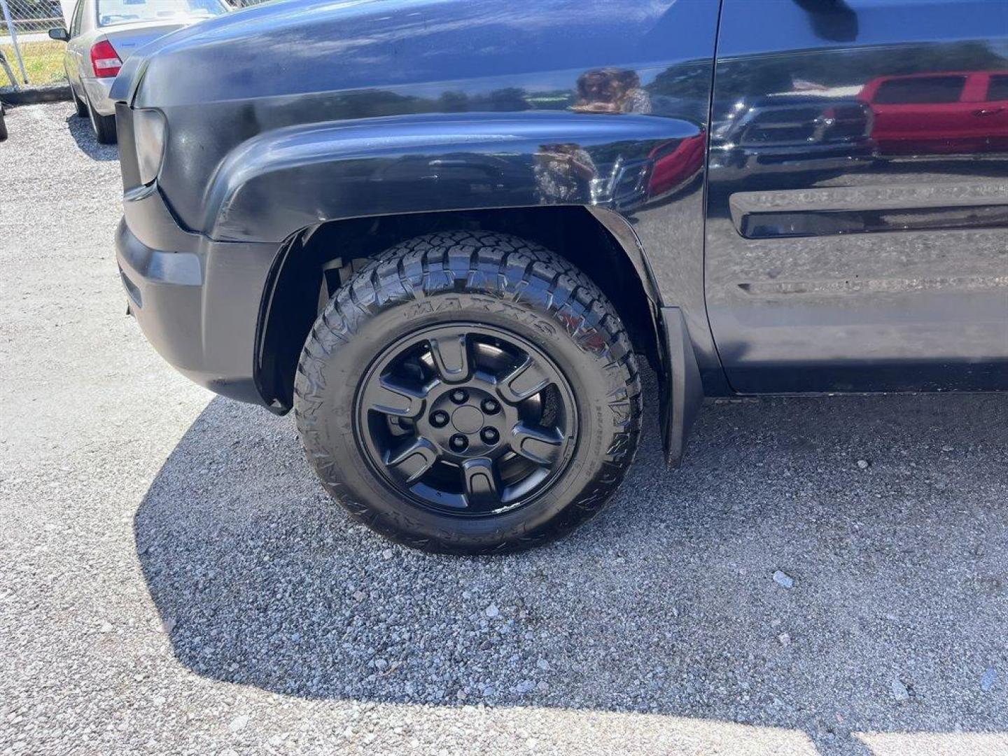 2007 Black /Grey Honda Ridgeline (2HJYK16567H) with an 3.5l V6 MPI Sohc Vtec 3.5 engine, Automatic transmission, located at 745 East Steele Rd., West Columbia, SC, 29170, (803) 755-9148, 33.927212, -81.148483 - Special Internet Price! 2007 Honda Ridgeline RTL with AM/FM radio, Remote keyless entry, Cruise control, Dual-zone automatic climate control, Leather interior, 60/40 split fold rear seat, Powered windows, Powered door locks, Plus more! - Photo#33