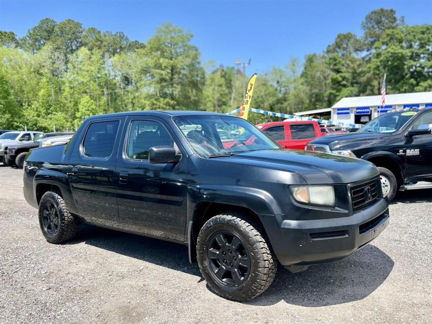 2007 Black /Grey Honda Ridgeline (2HJYK16567H) with an 3.5l V6 MPI Sohc Vtec 3.5 engine, Automatic transmission, located at 745 East Steele Rd., West Columbia, SC, 29170, (803) 755-9148, 33.927212, -81.148483 - Special Internet Price! 2007 Honda Ridgeline RTL with AM/FM radio, Remote keyless entry, Cruise control, Dual-zone automatic climate control, Leather interior, 60/40 split fold rear seat, Powered windows, Powered door locks, Plus more! - Photo#3