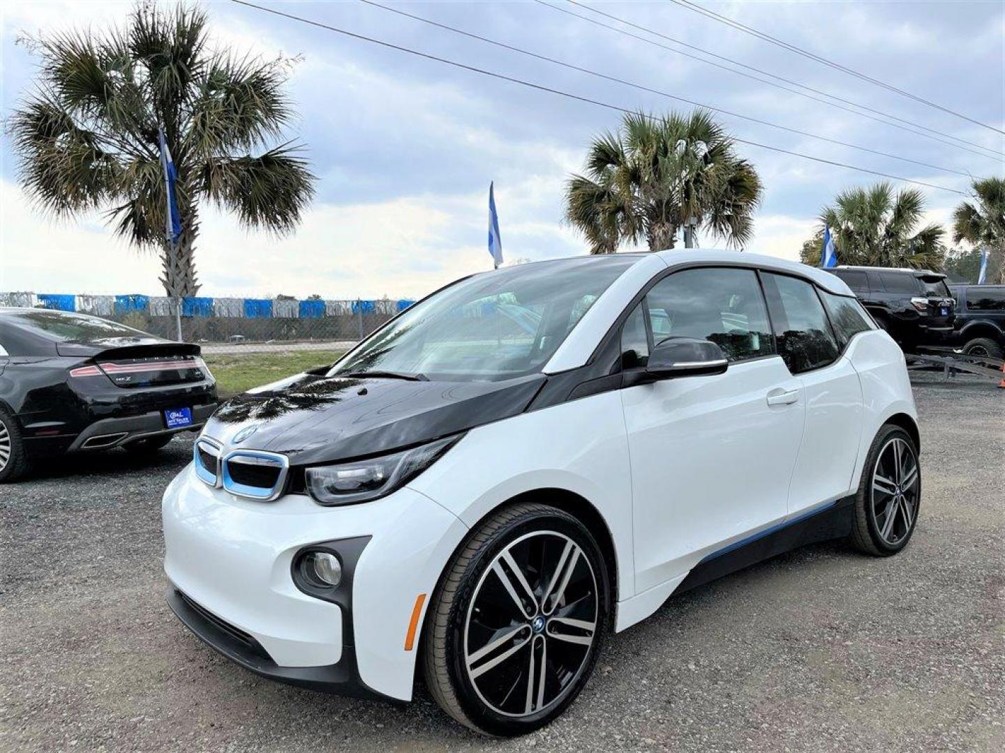 2015 White /Brown BMW i3 Base w/Range Extender (WBY1Z4C58FV) with an 22kw Elect 22kw engine, Automatic transmission, located at 745 East Steele Rd., West Columbia, SC, 29170, (803) 755-9148, 33.927212, -81.148483 - Special Internet Price! The 2015 BMI i3 with 22-kilowatt lithium-ion battery and produces 170 horsepower. The vehicle has a range of approximately 80 miles on a single charge. Advanced technology such as a navigation system, backup camera, Bluetooth, leather seats, plus more! - Photo#0