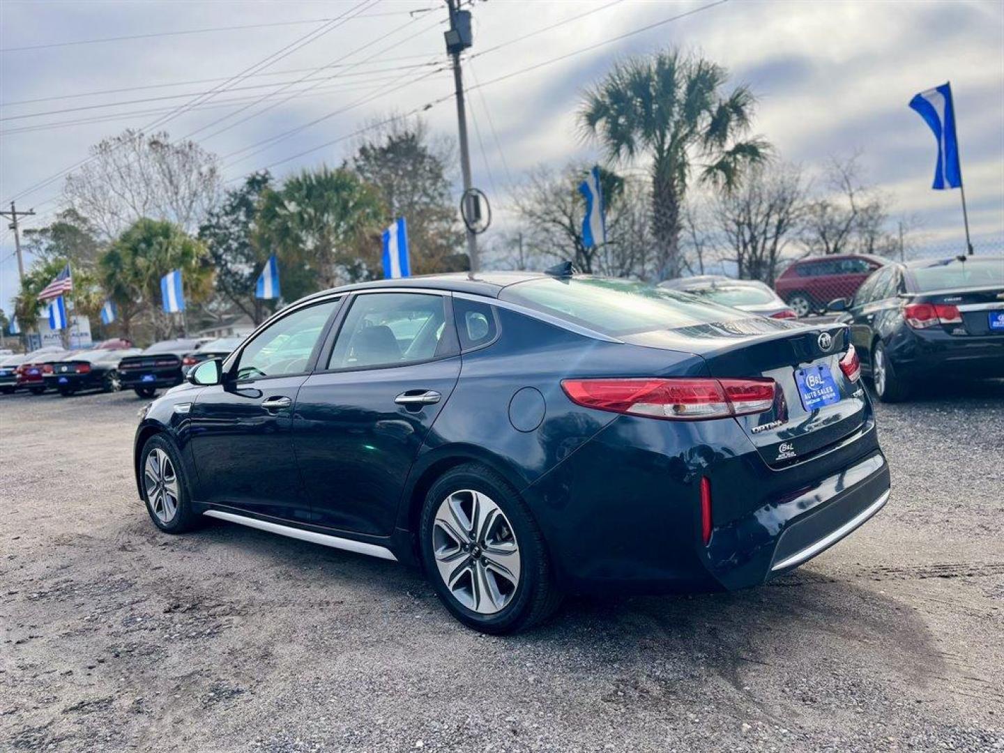 2017 Black /Black Kia Optima (KNAGU4LE0H5) with an 2.0l I-4 DI Dohc Hybrid 2 engine, Automatic transmission, located at 745 East Steele Rd., West Columbia, SC, 29170, (803) 755-9148, 33.927212, -81.148483 - Special Internet Price! 2017 Kia Optima Hybrid with Bluetooth, AM/FM/MP3/SiriusXM Premium Audio System, Backup Camera, Navigation, Cruise Control, Remote Keyless Entry, Black Leather Interior, Heated Front Seats, Dual Zone Front Automatic Air Conditioning, Plus More! - Photo#1