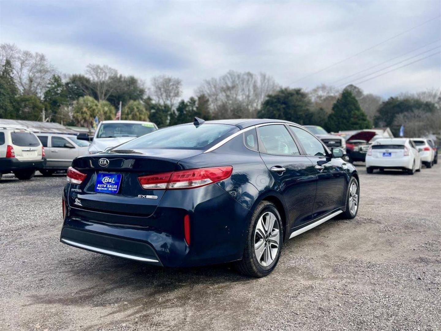 2017 Black /Black Kia Optima (KNAGU4LE0H5) with an 2.0l I-4 DI Dohc Hybrid 2 engine, Automatic transmission, located at 745 East Steele Rd., West Columbia, SC, 29170, (803) 755-9148, 33.927212, -81.148483 - Special Internet Price! 2017 Kia Optima Hybrid with Bluetooth, AM/FM/MP3/SiriusXM Premium Audio System, Backup Camera, Navigation, Cruise Control, Remote Keyless Entry, Black Leather Interior, Heated Front Seats, Dual Zone Front Automatic Air Conditioning, Plus More! - Photo#2