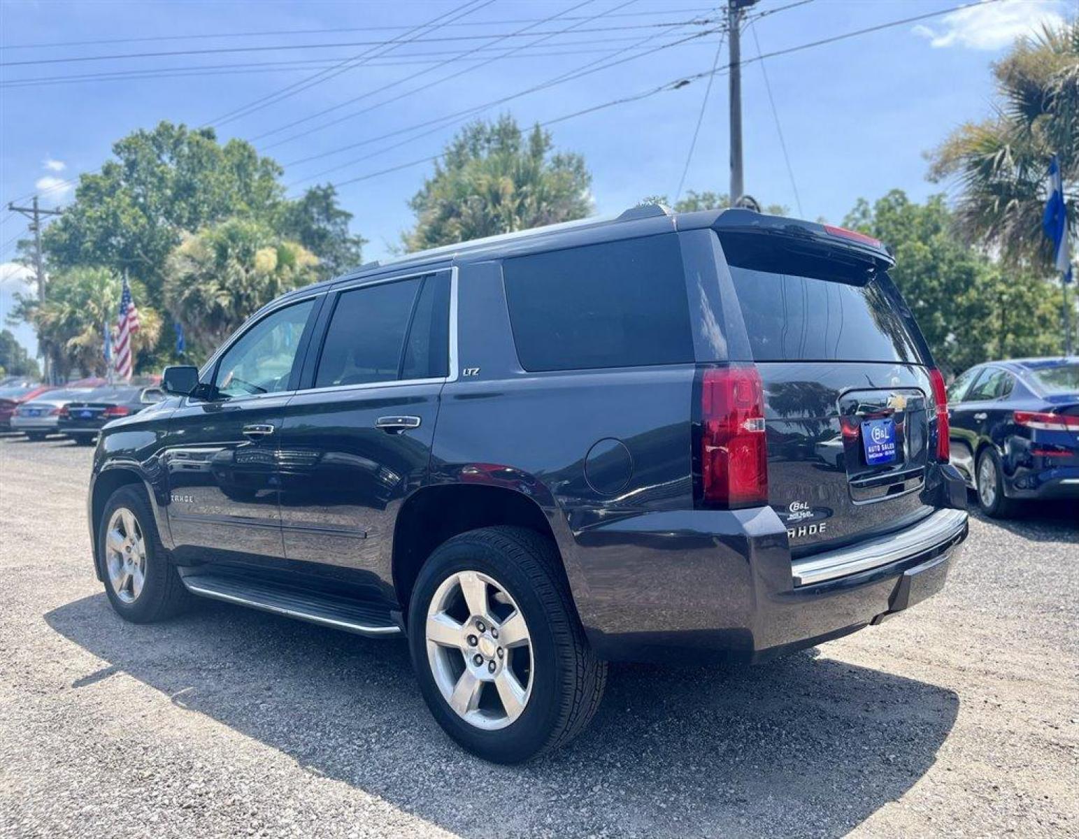 2016 Black /Black Chevrolet Tahoe LTZ 2WD (1GNSCCKC4GR) with an 5.3l V8 DI VVT Flex 5.3l engine, Automatic transmission, located at 745 East Steele Rd., West Columbia, SC, 29170, (803) 755-9148, 33.927212, -81.148483 - Special Internet Price! 2016 Chevrolet Tahoe LTZ with SiriusXM Satellite Radio, Bluetooth, Leather interior, Sunroof, Navigation, Backup camera, Power fold 3rd row, Cruise control, Push to start, Powered front seats, Lane Keep Assist, Plus more! - Photo #1