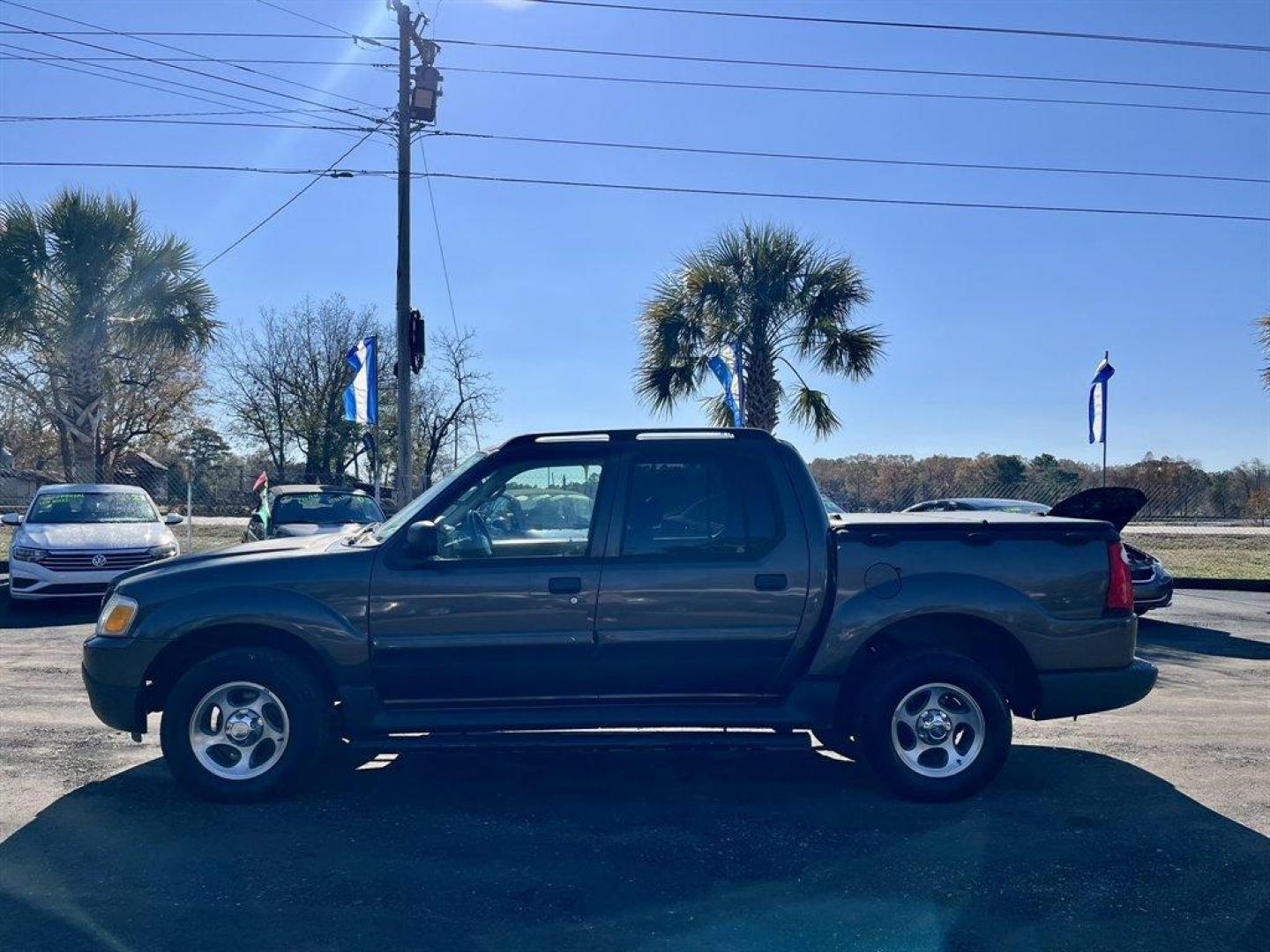 2005 Grey /Tan Ford Explorer Sport Trac (1FMZU67K65U) with an 4.0l V6 EFI Sohc 4.0l engine, Automatic transmission, located at 745 East Steele Rd., West Columbia, SC, 29170, (803) 755-9148, 33.927212, -81.148483 - Special Internet Price! 2005 Ford Explorer Sport Trac with AM/FM radio, Manual air conditioning, Leather interior, Powered windows, Powered door locks, Plus more! - Photo#1