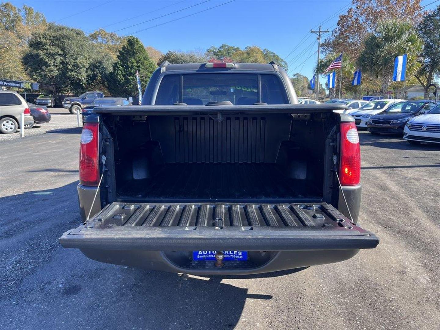 2005 Grey /Tan Ford Explorer Sport Trac (1FMZU67K65U) with an 4.0l V6 EFI Sohc 4.0l engine, Automatic transmission, located at 745 East Steele Rd., West Columbia, SC, 29170, (803) 755-9148, 33.927212, -81.148483 - Special Internet Price! 2005 Ford Explorer Sport Trac with AM/FM radio, Manual air conditioning, Leather interior, Powered windows, Powered door locks, Plus more! - Photo#22