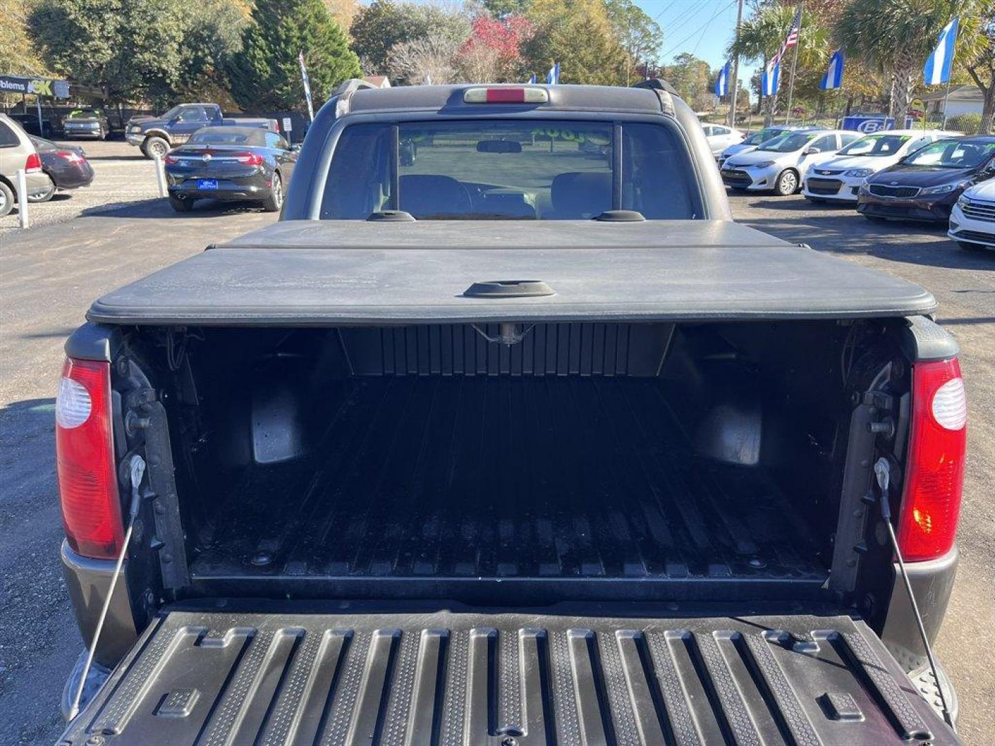 2005 Grey /Tan Ford Explorer Sport Trac (1FMZU67K65U) with an 4.0l V6 EFI Sohc 4.0l engine, Automatic transmission, located at 745 East Steele Rd., West Columbia, SC, 29170, (803) 755-9148, 33.927212, -81.148483 - Special Internet Price! 2005 Ford Explorer Sport Trac with AM/FM radio, Manual air conditioning, Leather interior, Powered windows, Powered door locks, Plus more! - Photo#23