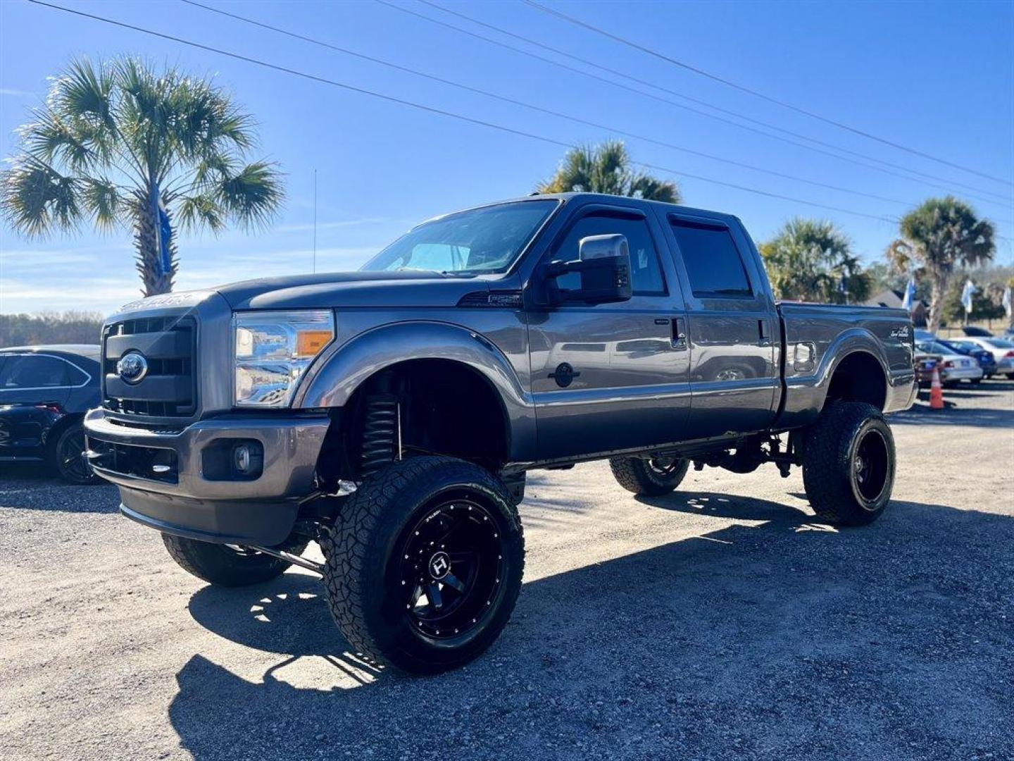 2012 Grey /Black Ford F250sd (1FT7W2BTXCE) with an 6.7l V8 DI OHC Tdsl 6.7l engine, Automatic transmission, located at 745 East Steele Rd., West Columbia, SC, 29170, (803) 755-9148, 33.927212, -81.148483 - Special Internet Price! 2012 Ford F250SD with Bluetooth, AM/FM stereo radio, Backup Camera, Sunroof, Air conditioning, Keyless entry, Powered running boards, Leather interior, Tailgate step, Powered driver seat, Powered windows, Powered door locks, Plus more! - Photo#0