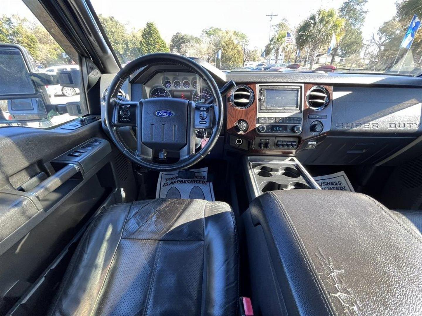 2012 Grey /Black Ford F250sd (1FT7W2BTXCE) with an 6.7l V8 DI OHC Tdsl 6.7l engine, Automatic transmission, located at 745 East Steele Rd., West Columbia, SC, 29170, (803) 755-9148, 33.927212, -81.148483 - Special Internet Price! 2012 Ford F250SD with Bluetooth, AM/FM stereo radio, Backup Camera, Sunroof, Air conditioning, Keyless entry, Powered running boards, Leather interior, Tailgate step, Powered driver seat, Powered windows, Powered door locks, Plus more! - Photo#4