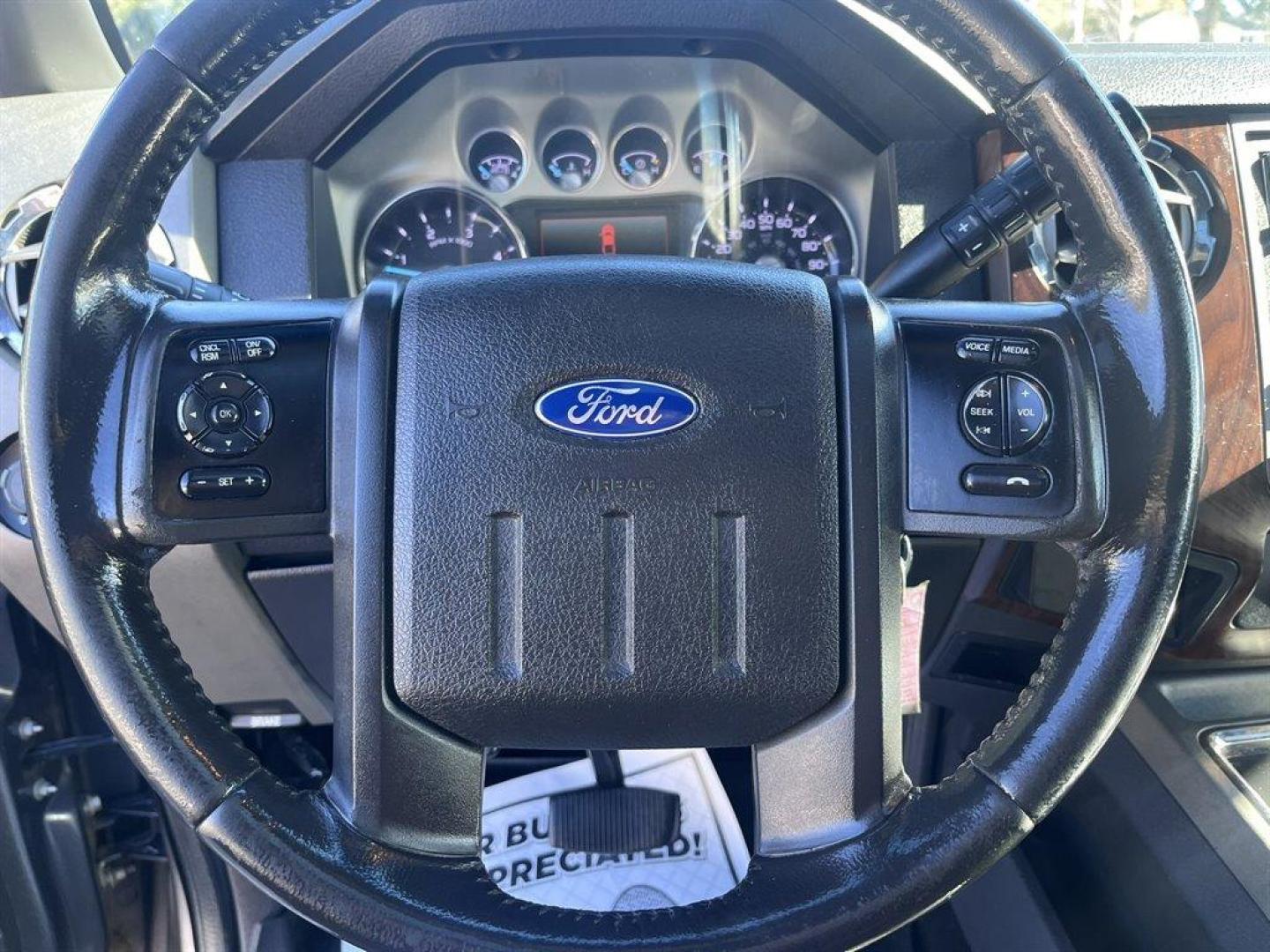 2012 Grey /Black Ford F250sd (1FT7W2BTXCE) with an 6.7l V8 DI OHC Tdsl 6.7l engine, Automatic transmission, located at 745 East Steele Rd., West Columbia, SC, 29170, (803) 755-9148, 33.927212, -81.148483 - Special Internet Price! 2012 Ford F250SD with Bluetooth, AM/FM stereo radio, Backup Camera, Sunroof, Air conditioning, Keyless entry, Powered running boards, Leather interior, Tailgate step, Powered driver seat, Powered windows, Powered door locks, Plus more! - Photo#6