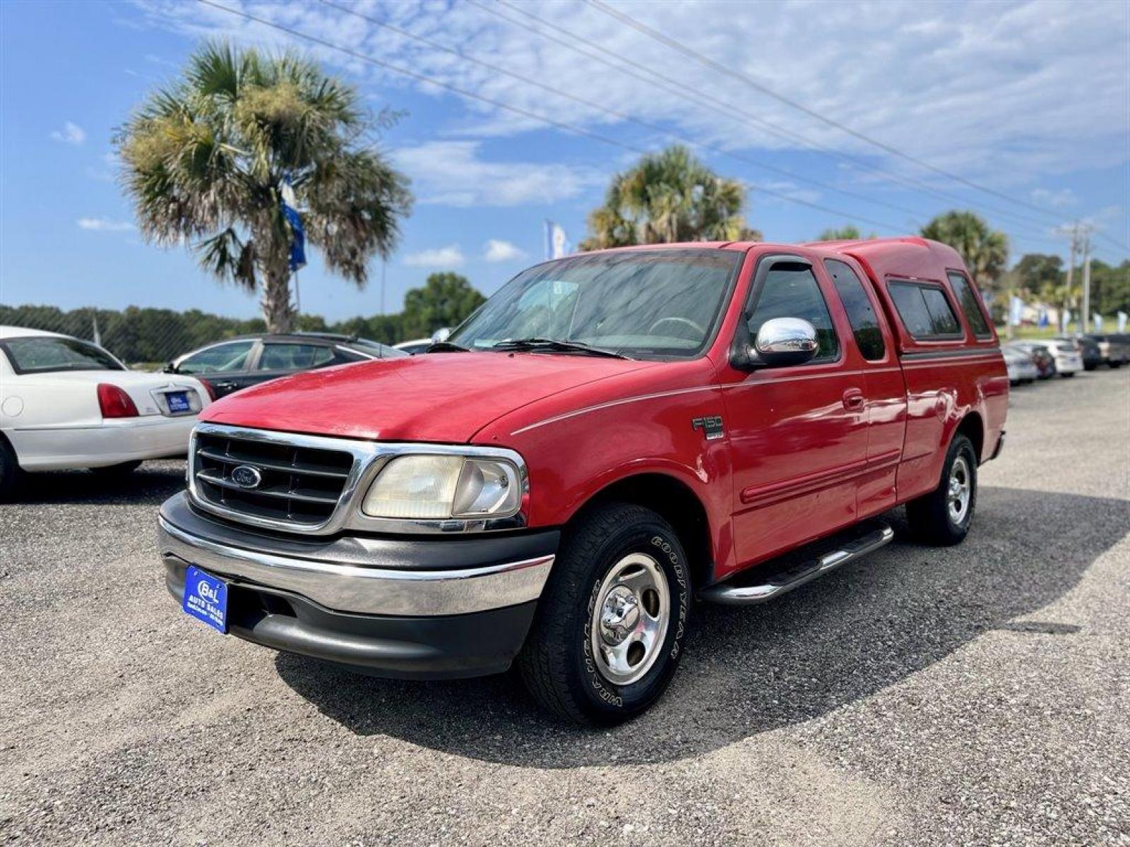 2000 Red /Grey Ford F150 (1FTRX17W0YN) with an 4.6l V8 EFI Sohc 4.6l engine, Automatic transmission, located at 745 East Steele Rd., West Columbia, SC, 29170, (803) 755-9148, 33.927212, -81.148483 - Special Internet Price! 2000 Ford F150 XLT with Electronic AM/FM stereo radio, Cruise control, Cloth interior, Powered door locks, Powered windows, Seats up to 6, Truck bed cap, Plus more! - Photo #0
