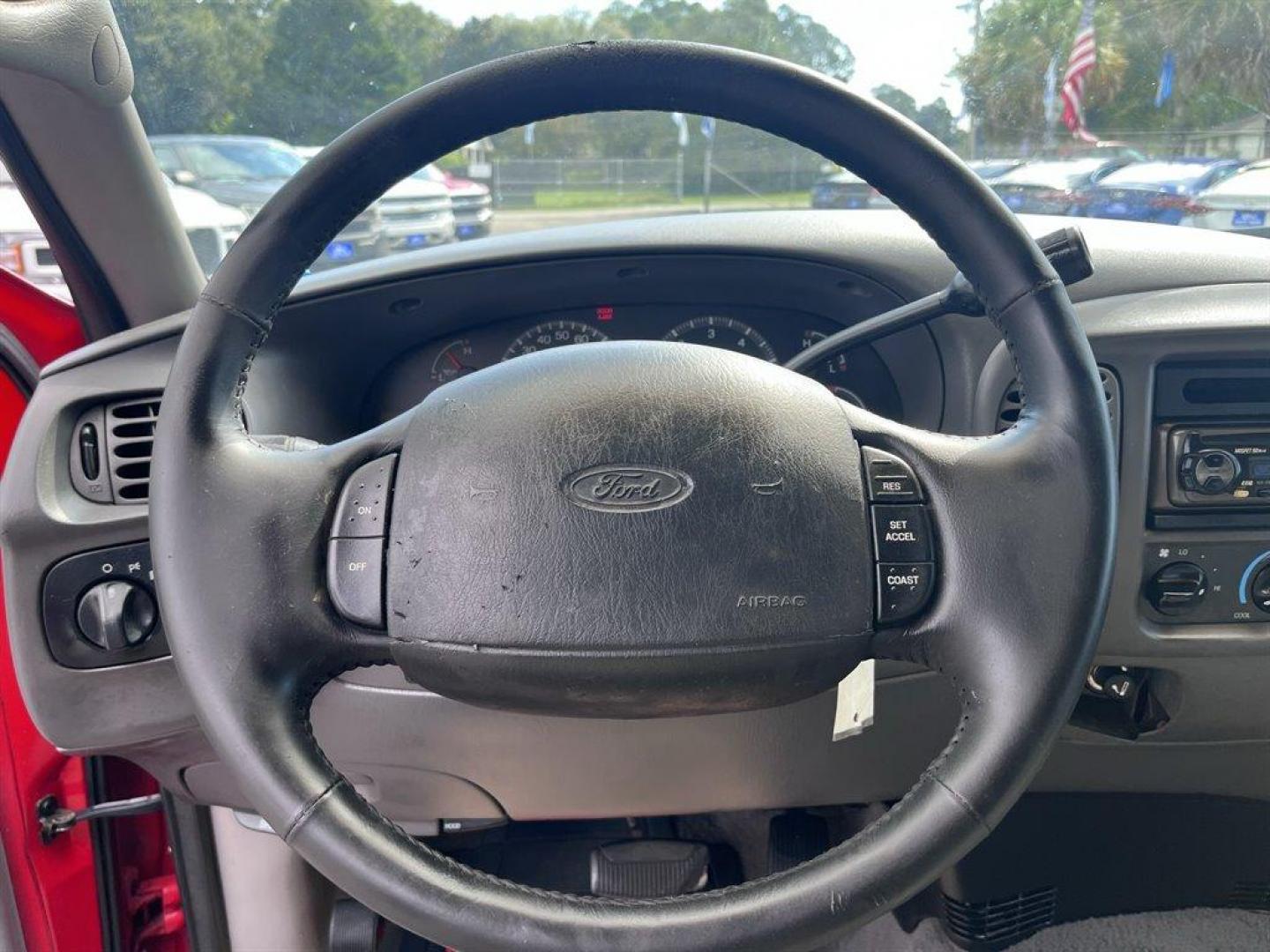 2000 Red /Grey Ford F150 (1FTRX17W0YN) with an 4.6l V8 EFI Sohc 4.6l engine, Automatic transmission, located at 745 East Steele Rd., West Columbia, SC, 29170, (803) 755-9148, 33.927212, -81.148483 - Special Internet Price! 2000 Ford F150 XLT with Electronic AM/FM stereo radio, Cruise control, Cloth interior, Powered door locks, Powered windows, Seats up to 6, Truck bed cap, Plus more! - Photo#5