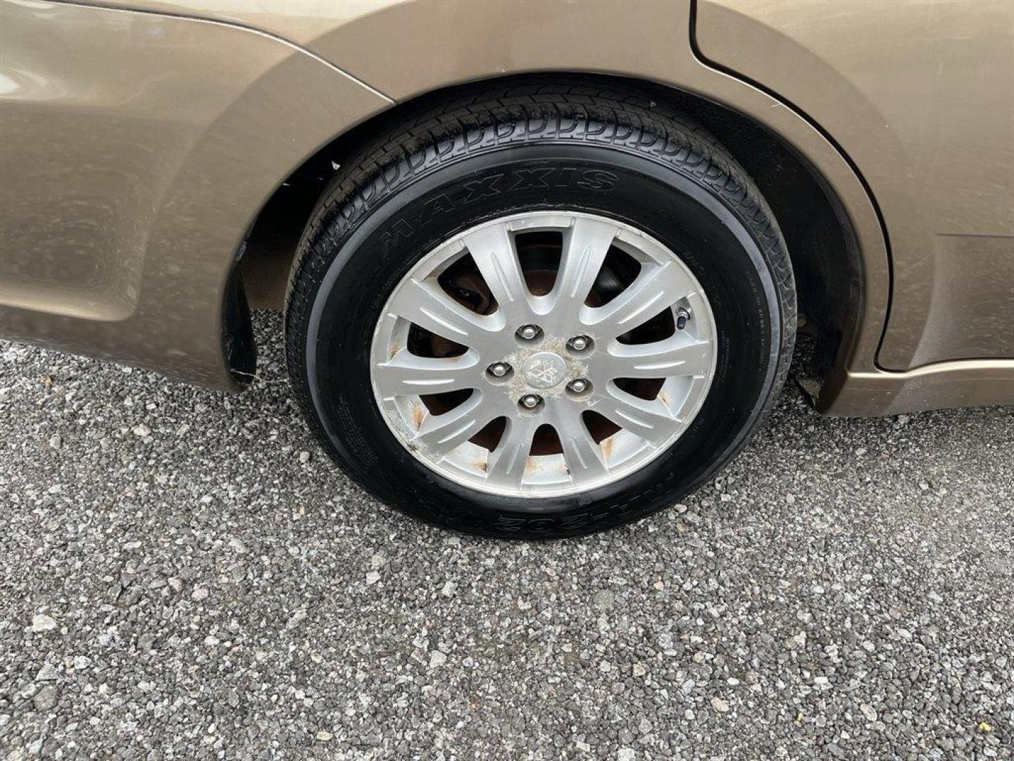 2009 Gold /Tan Mitsubishi Galant ES (4A3AB36F79E) with an 2.4l I-4 MPI Sohc 2.4l engine, Automatic transmission, located at 745 East Steele Rd., West Columbia, SC, 29170, (803) 755-9148, 33.927212, -81.148483 - Special Internet Price! BUY HERE, PAY HERE - $680 DOWN PAYMENT! 2009 Mitsubishi Galant with Cloth interior, Cruise control, Remote keyless entry, Powered door locks, Powered windows, Plus more! - Photo#26