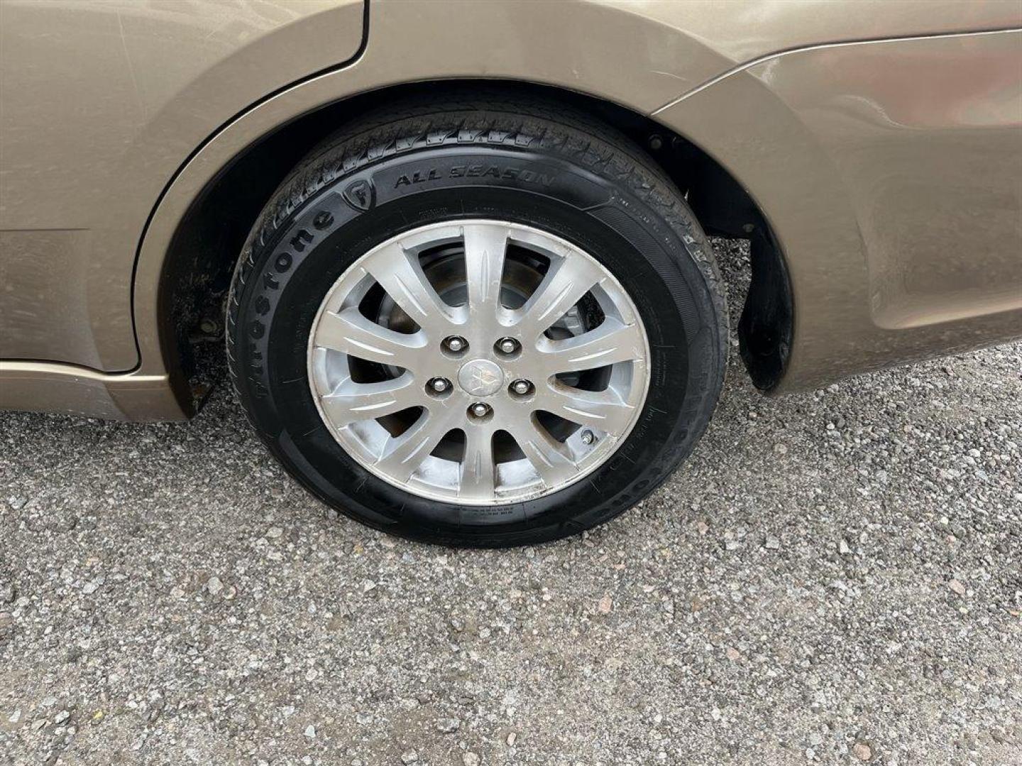 2009 Gold /Tan Mitsubishi Galant ES (4A3AB36F79E) with an 2.4l I-4 MPI Sohc 2.4l engine, Automatic transmission, located at 745 East Steele Rd., West Columbia, SC, 29170, (803) 755-9148, 33.927212, -81.148483 - Special Internet Price! BUY HERE, PAY HERE - $680 DOWN PAYMENT! 2009 Mitsubishi Galant with Cloth interior, Cruise control, Remote keyless entry, Powered door locks, Powered windows, Plus more! - Photo#27