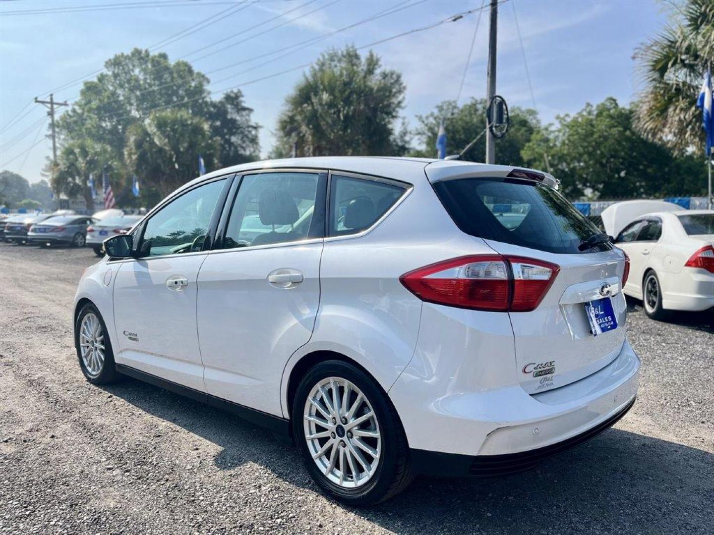 2014 White /Black Ford C-MAX SEL (1FADP5CU8EL) with an 2.0l I-4 Smpi Dohc Phev 2 engine, Automatic transmission, located at 745 East Steele Rd., West Columbia, SC, 29170, (803) 755-9148, 33.927212, -81.148483 - Special Internet Price! 2014 FORD C-MAX SEL with AM/FM/CD/MP3,Radio w/Seek-Scan, Cruise Control w/Steering Wheel Controls, Leather interior, Front powered seats, Panoramic sunroof, Backup camera, Navigation, Bluetooth, Plus more! - Photo#1