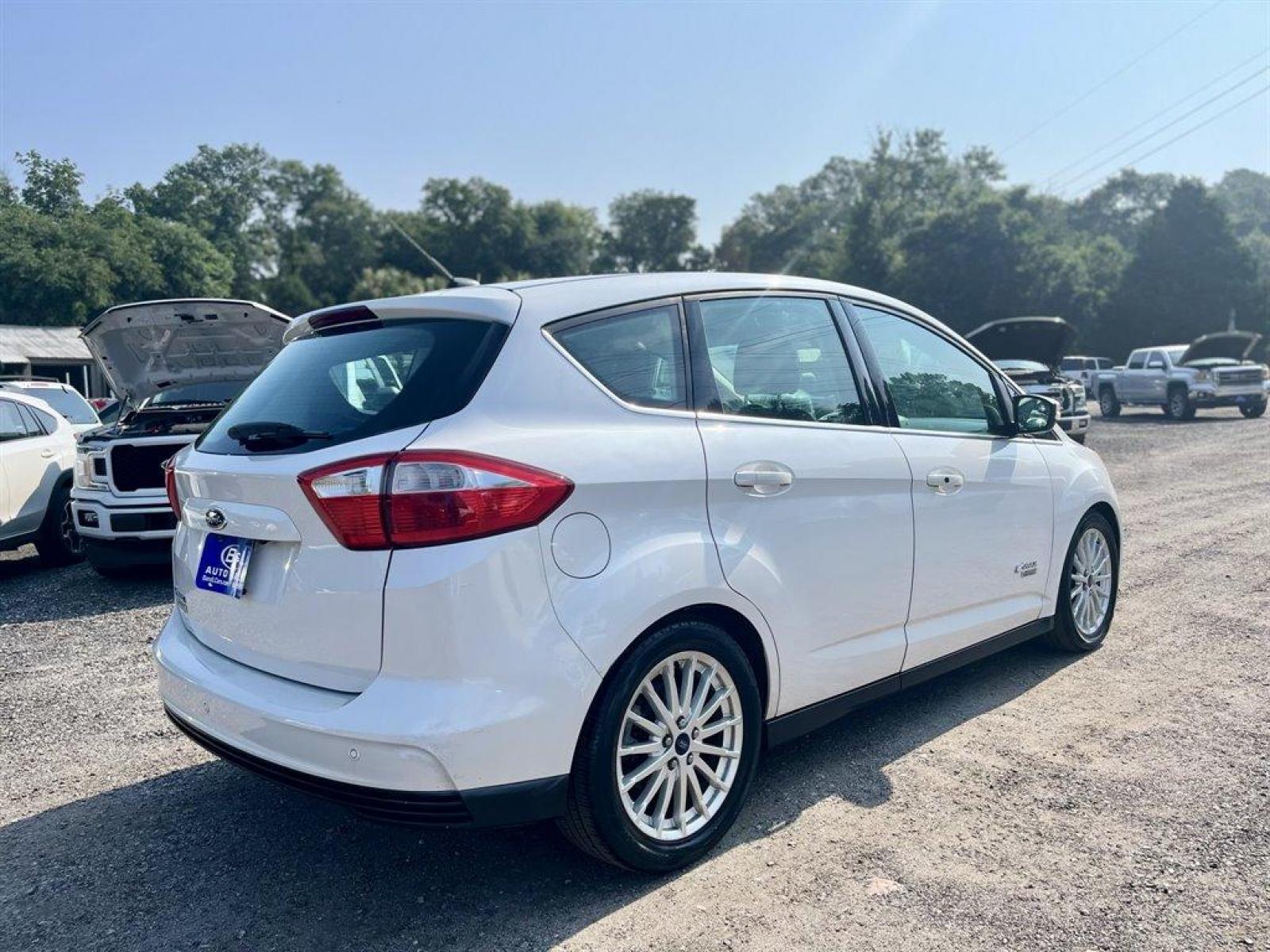 2014 White /Black Ford C-MAX SEL (1FADP5CU8EL) with an 2.0l I-4 Smpi Dohc Phev 2 engine, Automatic transmission, located at 745 East Steele Rd., West Columbia, SC, 29170, (803) 755-9148, 33.927212, -81.148483 - Special Internet Price! 2014 FORD C-MAX SEL with AM/FM/CD/MP3,Radio w/Seek-Scan, Cruise Control w/Steering Wheel Controls, Leather interior, Front powered seats, Panoramic sunroof, Backup camera, Navigation, Bluetooth, Plus more! - Photo #2