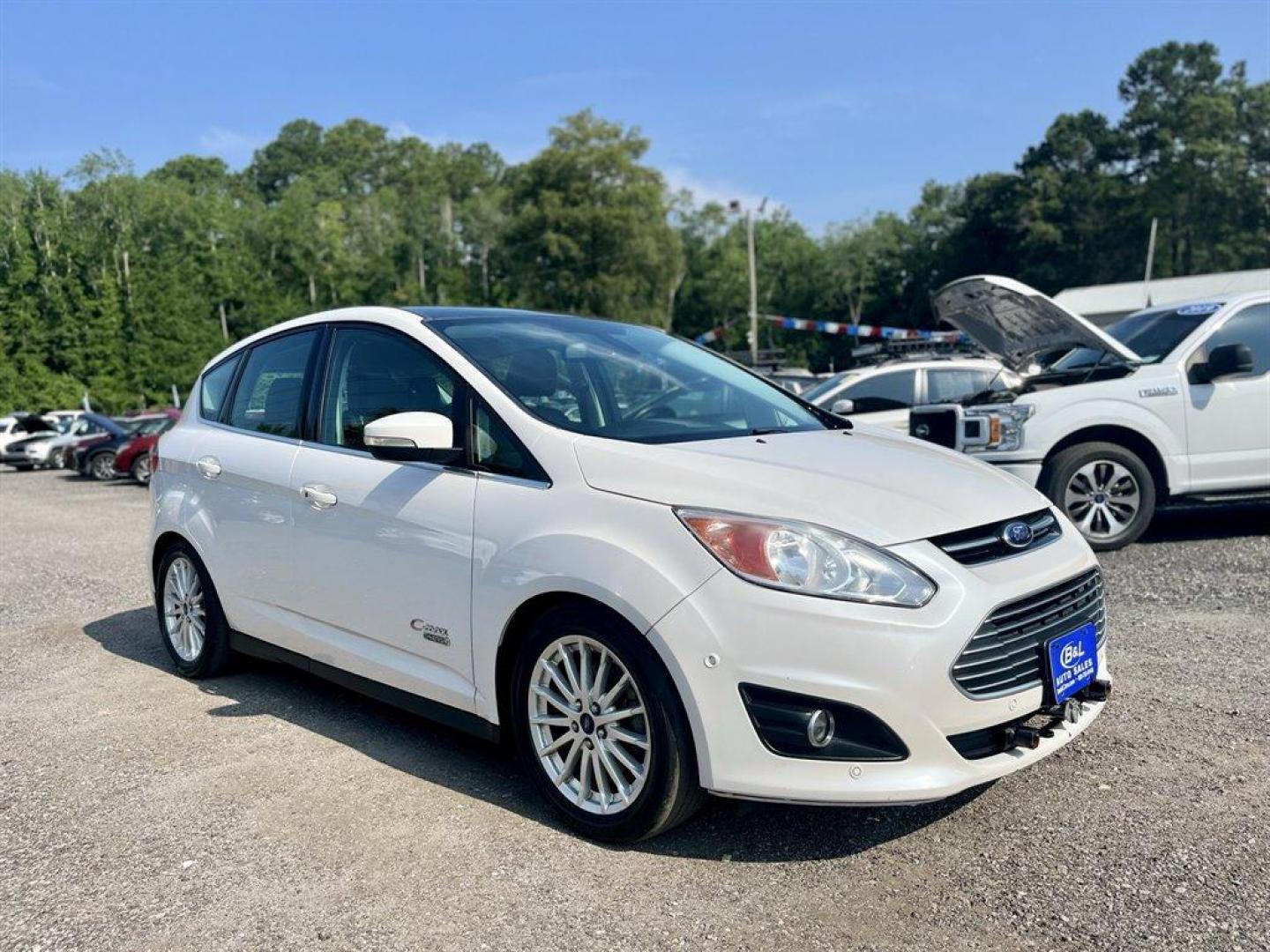 2014 White /Black Ford C-MAX SEL (1FADP5CU8EL) with an 2.0l I-4 Smpi Dohc Phev 2 engine, Automatic transmission, located at 745 East Steele Rd., West Columbia, SC, 29170, (803) 755-9148, 33.927212, -81.148483 - Special Internet Price! 2014 FORD C-MAX SEL with AM/FM/CD/MP3,Radio w/Seek-Scan, Cruise Control w/Steering Wheel Controls, Leather interior, Front powered seats, Panoramic sunroof, Backup camera, Navigation, Bluetooth, Plus more! - Photo#3