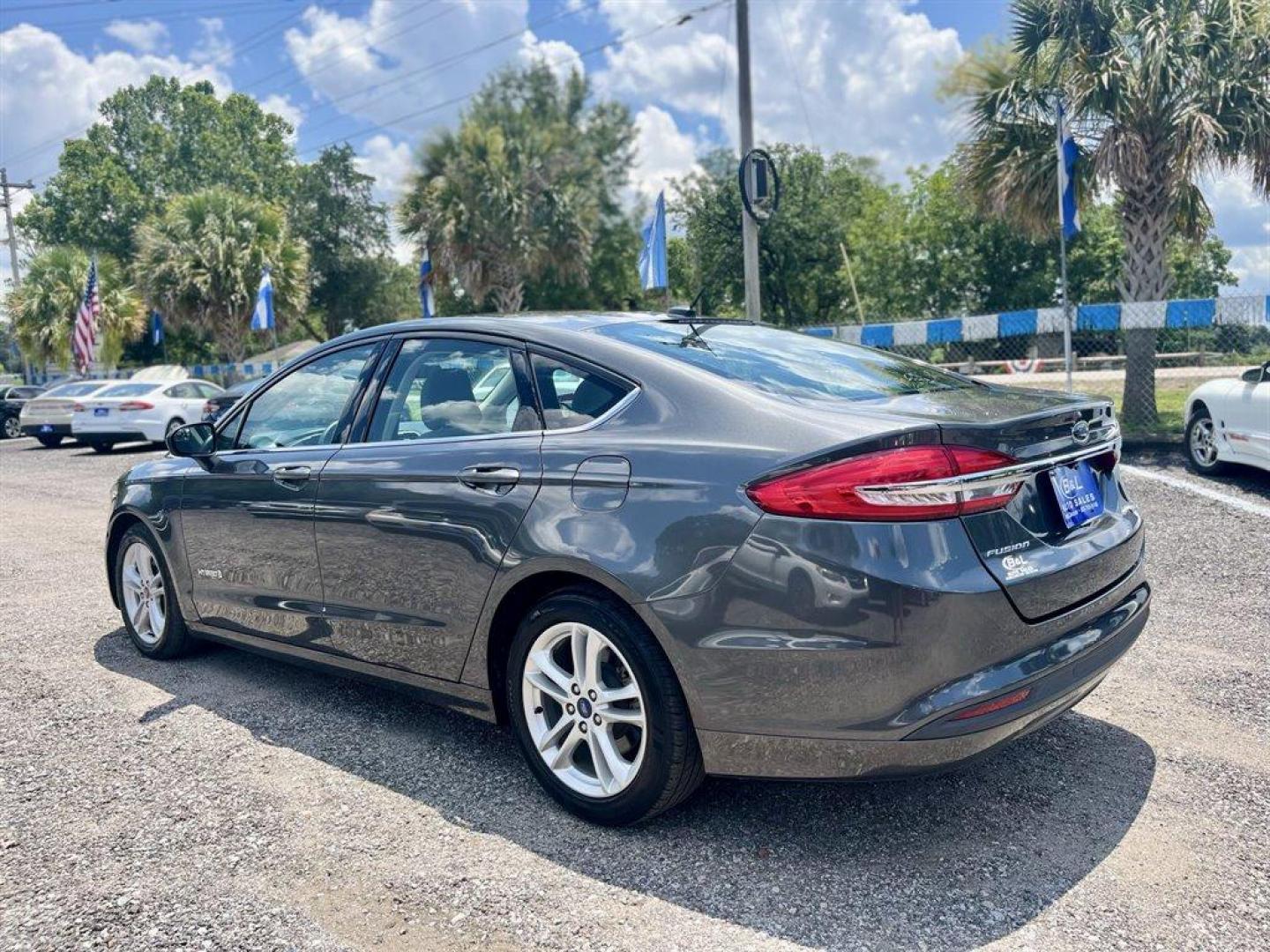 2018 Grey /Grey Ford Fusion (3FA6P0UU5JR) with an 2.0l I-4 Smpi Dohc Hybrid engine, Automatic transmission, located at 745 East Steele Rd., West Columbia, SC, 29170, (803) 755-9148, 33.927212, -81.148483 - Special Internet Price! 2018 FORD FUSION S HYBRID with Radio w/Seek-Scan, Bluetooth, Cruise Control, Backup Camera, 4.2 LCD screen, Remote Keyless Entry, Push to Start, Cloth Interior, 60-40 Folding Bench Rear Seats, Plus More! - Photo#1