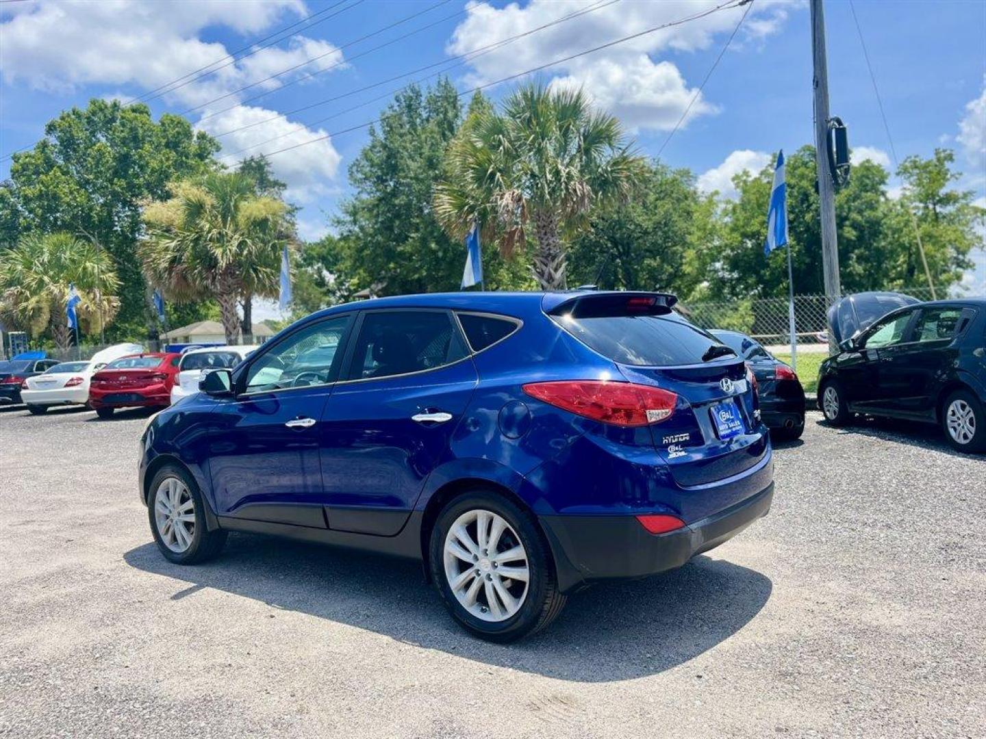 2013 Blue /Grey Hyundai Tucson (KM8JU3AC2DU) with an 2.4l I-4 MPI Dohc 2.4l engine, Automatic transmission, located at 745 East Steele Rd., West Columbia, SC, 29170, (803) 755-9148, 33.927212, -81.148483 - Special Internet Price! 2013 Hyundai Tucson Limited with AM/FM radio, Backup camera, Cruise control, Dual moonroof, Leather interior, Automatic air conditioning, Powered windows, Powered door locks, Plus more! - Photo#1