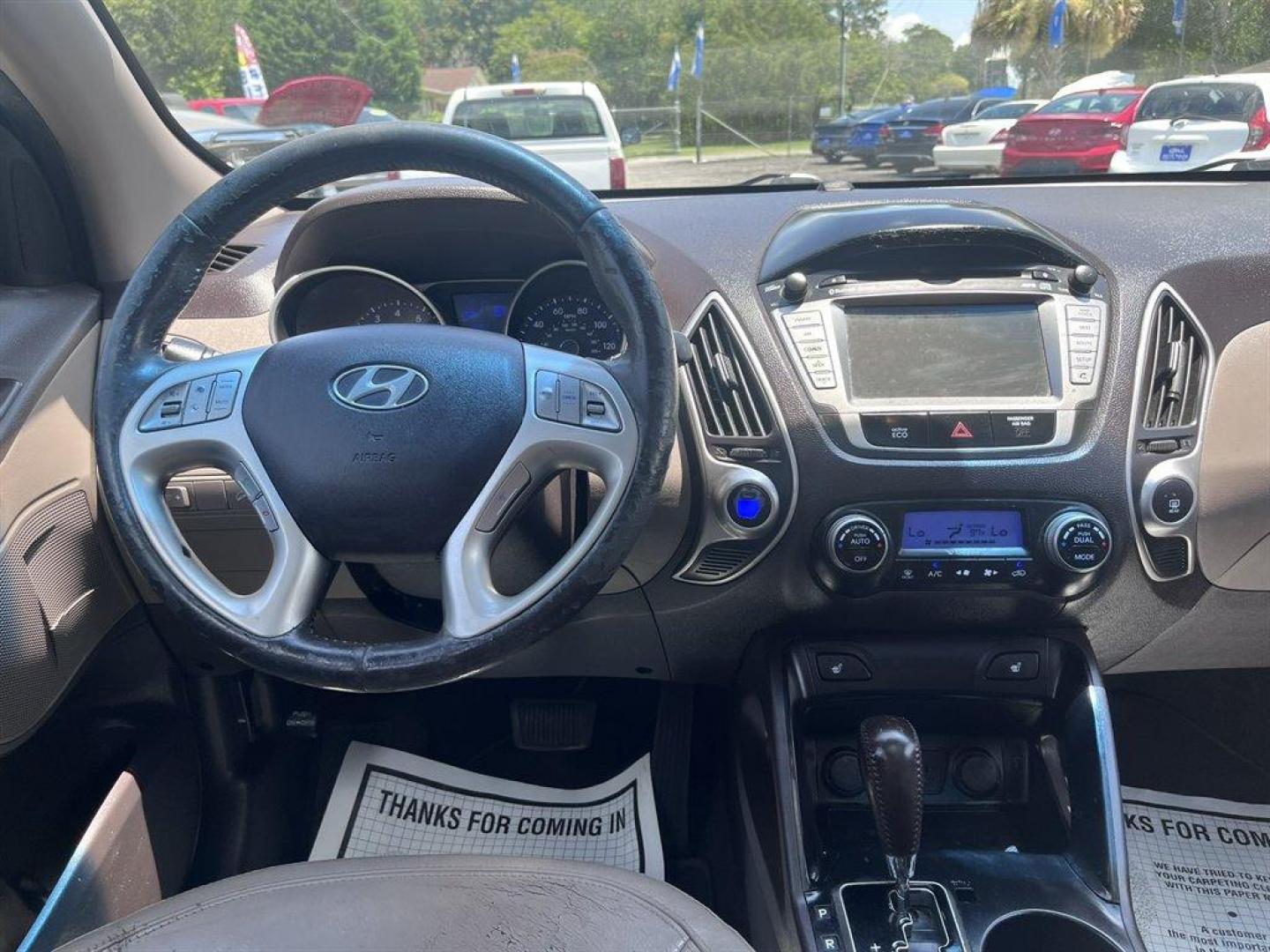 2013 Blue /Grey Hyundai Tucson (KM8JU3AC2DU) with an 2.4l I-4 MPI Dohc 2.4l engine, Automatic transmission, located at 745 East Steele Rd., West Columbia, SC, 29170, (803) 755-9148, 33.927212, -81.148483 - Special Internet Price! 2013 Hyundai Tucson Limited with AM/FM radio, Backup camera, Cruise control, Dual moonroof, Leather interior, Automatic air conditioning, Powered windows, Powered door locks, Plus more! - Photo#4