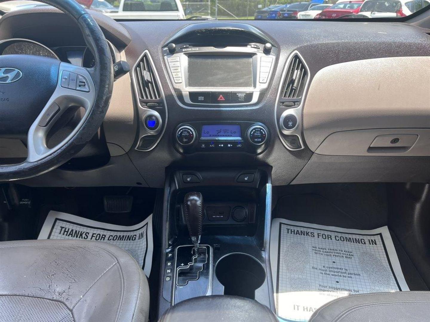 2013 Blue /Grey Hyundai Tucson (KM8JU3AC2DU) with an 2.4l I-4 MPI Dohc 2.4l engine, Automatic transmission, located at 745 East Steele Rd., West Columbia, SC, 29170, (803) 755-9148, 33.927212, -81.148483 - Special Internet Price! 2013 Hyundai Tucson Limited with AM/FM radio, Backup camera, Cruise control, Dual moonroof, Leather interior, Automatic air conditioning, Powered windows, Powered door locks, Plus more! - Photo#9