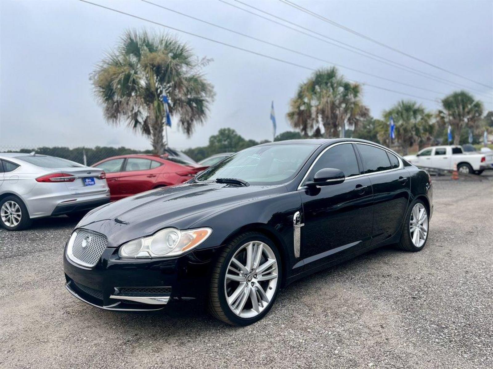 2011 Black /Burgundy Jaguar XF (SAJWA0HE6BM) with an 5.0l V8 DI Dohc S/C 5.0l engine, Automatic transmission, located at 745 East Steele Rd., West Columbia, SC, 29170, (803) 755-9148, 33.927212, -81.148483 - 2011 JAGUAR XF with 7 touch screen display, Bluetooth, Backup camera, Memory driver seat, Leather interior, Cruise control, Navigation, Jaguar Smart Key System, Rear parking aid, Powered windows, Powered door locks, Plus more! - Photo #0