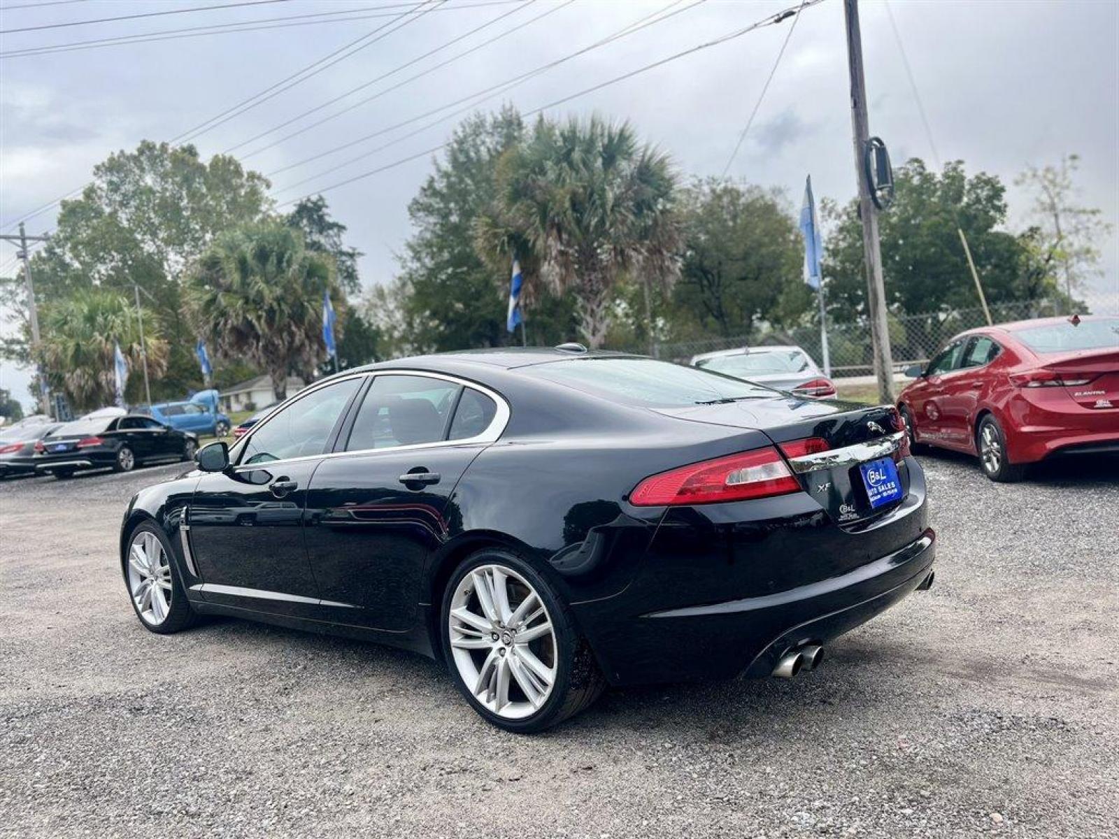 2011 Black /Burgundy Jaguar XF (SAJWA0HE6BM) with an 5.0l V8 DI Dohc S/C 5.0l engine, Automatic transmission, located at 745 East Steele Rd., West Columbia, SC, 29170, (803) 755-9148, 33.927212, -81.148483 - 2011 JAGUAR XF with 7 touch screen display, Bluetooth, Backup camera, Memory driver seat, Leather interior, Cruise control, Navigation, Jaguar Smart Key System, Rear parking aid, Powered windows, Powered door locks, Plus more! - Photo #1