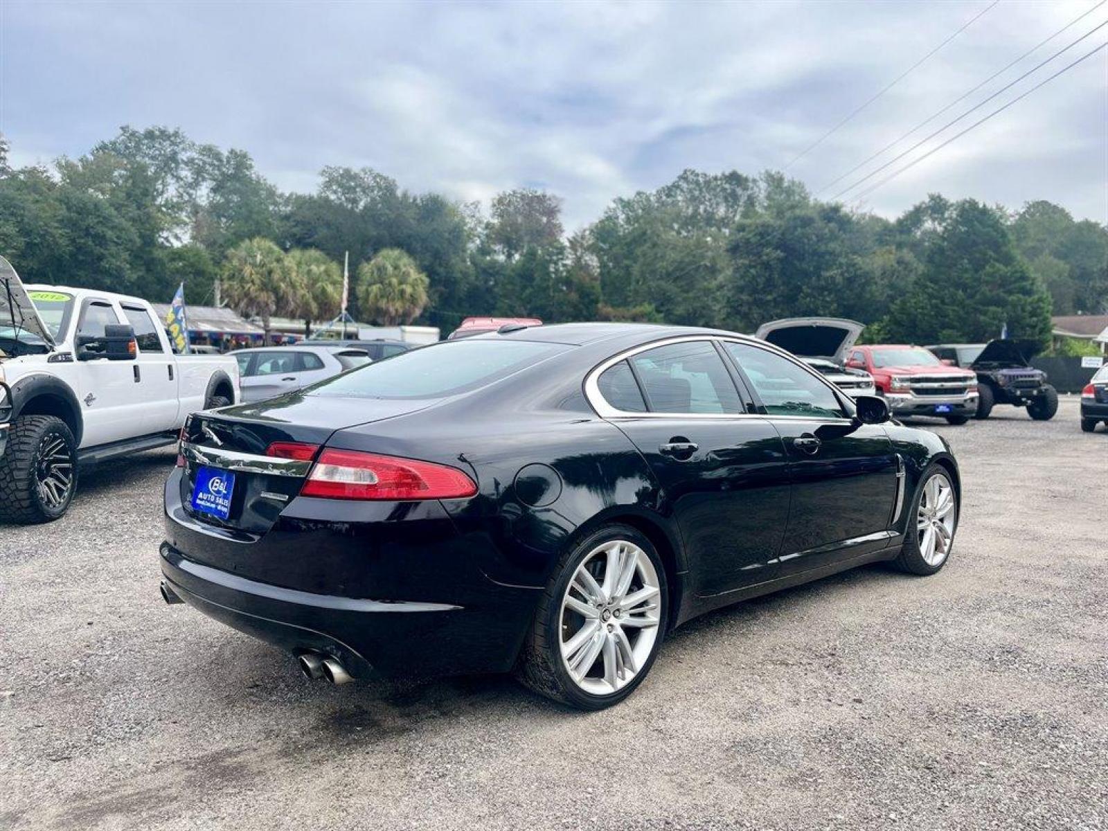 2011 Black /Burgundy Jaguar XF (SAJWA0HE6BM) with an 5.0l V8 DI Dohc S/C 5.0l engine, Automatic transmission, located at 745 East Steele Rd., West Columbia, SC, 29170, (803) 755-9148, 33.927212, -81.148483 - 2011 JAGUAR XF with 7 touch screen display, Bluetooth, Backup camera, Memory driver seat, Leather interior, Cruise control, Navigation, Jaguar Smart Key System, Rear parking aid, Powered windows, Powered door locks, Plus more! - Photo #2