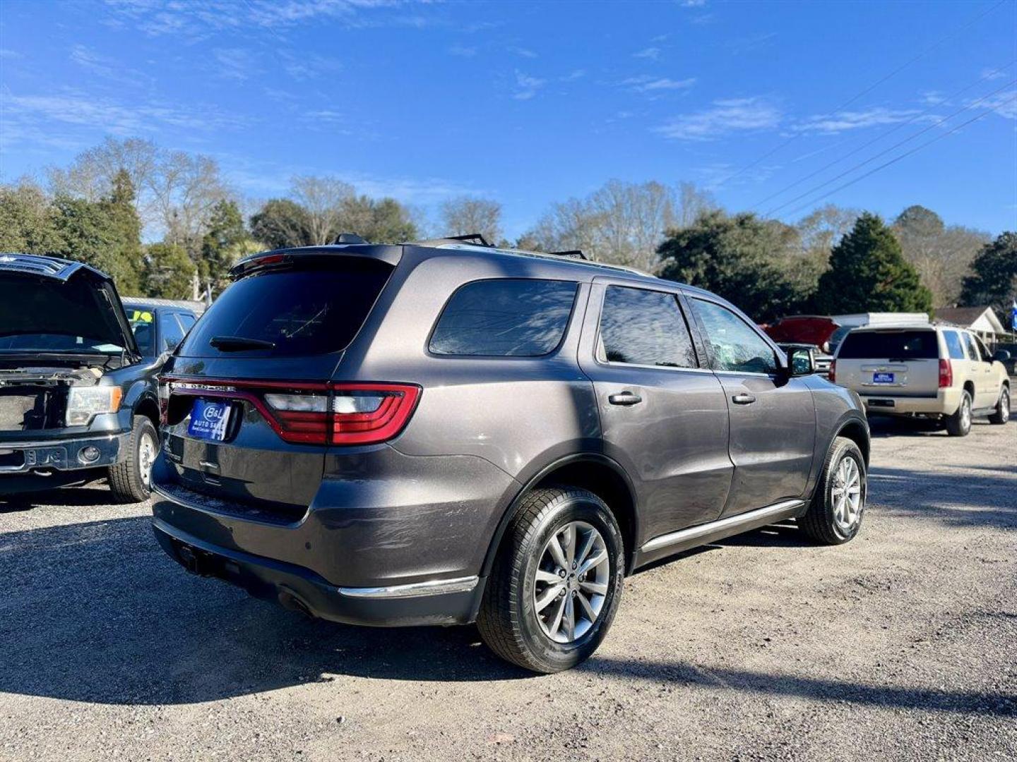 2017 Grey /Tan Dodge Durango (1C4RDJAGXHC) with an 3.6l V6 MPI Dohc 3.6l engine, Automatic transmission, located at 745 East Steele Rd., West Columbia, SC, 29170, (803) 755-9148, 33.927212, -81.148483 - Special Internet Price! 2017 Dodge Durango SXT with Uconnect, Cruise Control, Keyless Entry, Dual Zone Front Automatic Air Conditioning, Cargo Area Concealed Storage, 3rd Row Seating, Cloth Interior, Heated Front Seats, Powered Driver Seat, Powered Windows, Powered Door Locks, Plus More! - Photo#2