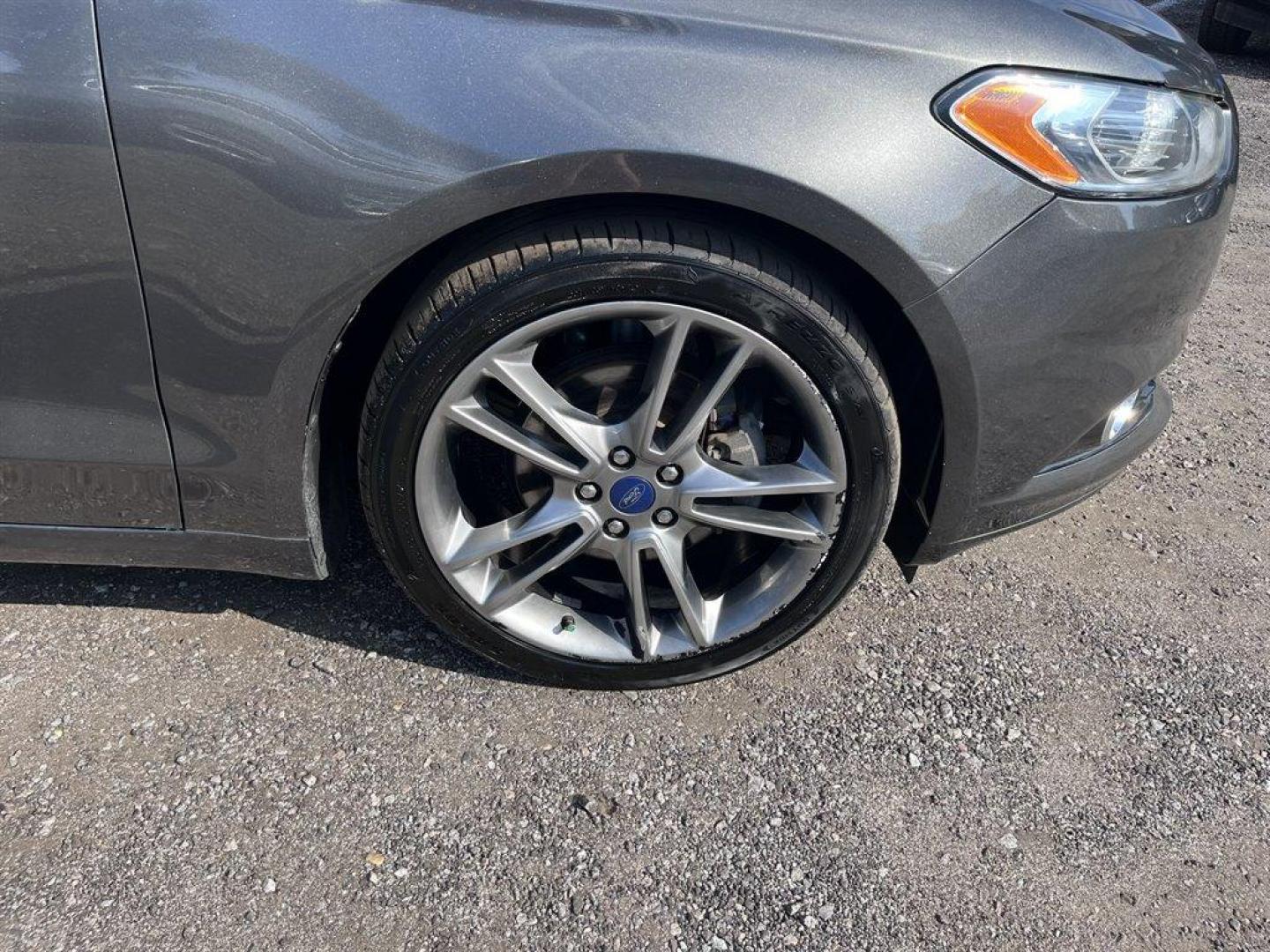 2015 Grey /Black Ford Fusion (3FA6P0K9XFR) with an 2.0l I-4 DI T/C Ecoboost engine, Automatic transmission, located at 745 East Steele Rd., West Columbia, SC, 29170, (803) 755-9148, 33.927212, -81.148483 - Special Internet Price! 2015 Ford Fusion Titanium with Bluetooth, Backup camera, Navigation, Sunroof, SIRIUS Satellite Radio, Remote Keyless Entry, Leather Interior, Rear 60-40 Folding Bench, Cruise Control with Steering Wheel Controls, Plus more! - Photo#32