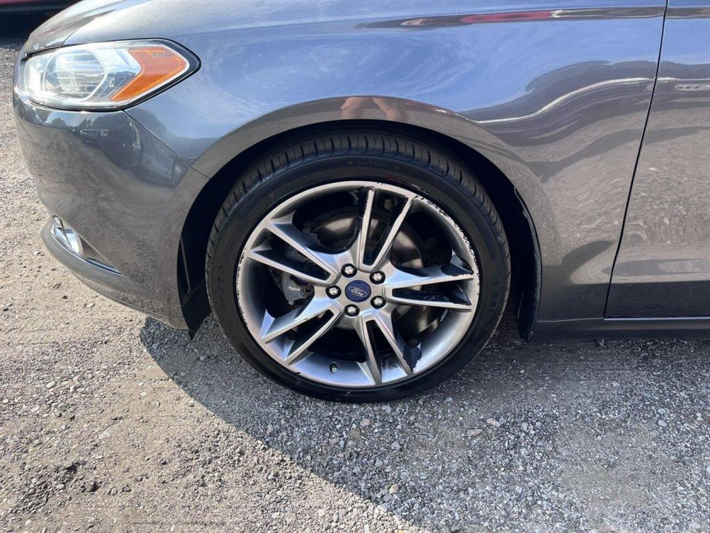 2015 Grey /Black Ford Fusion (3FA6P0K9XFR) with an 2.0l I-4 DI T/C Ecoboost engine, Automatic transmission, located at 745 East Steele Rd., West Columbia, SC, 29170, (803) 755-9148, 33.927212, -81.148483 - Special Internet Price! 2015 Ford Fusion Titanium with Bluetooth, Backup camera, Navigation, Sunroof, SIRIUS Satellite Radio, Remote Keyless Entry, Leather Interior, Rear 60-40 Folding Bench, Cruise Control with Steering Wheel Controls, Plus more! - Photo#35