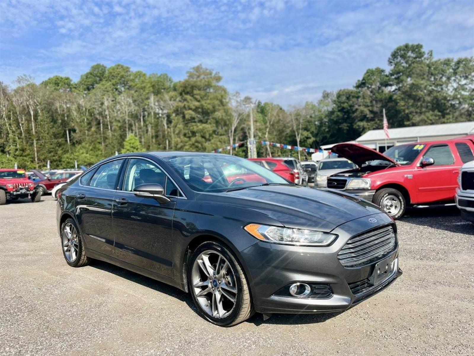 2015 Grey /Black Ford Fusion (3FA6P0K9XFR) with an 2.0l I-4 DI T/C Ecoboost engine, Automatic transmission, located at 745 East Steele Rd., West Columbia, SC, 29170, (803) 755-9148, 33.927212, -81.148483 - Special Internet Price! 2015 Ford Fusion Titanium with Bluetooth, Backup camera, Navigation, Sunroof, SIRIUS Satellite Radio, Remote Keyless Entry, Leather Interior, Rear 60-40 Folding Bench, Cruise Control with Steering Wheel Controls, Plus more! - Photo #3