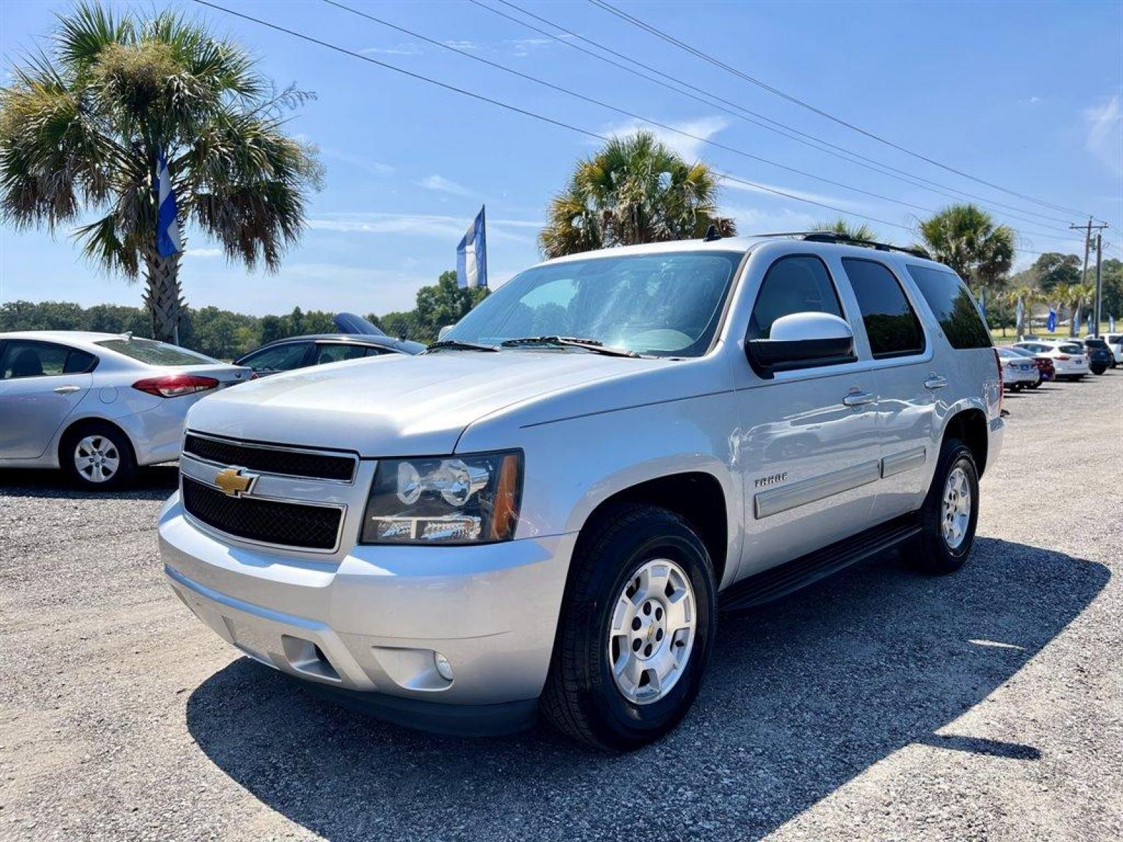 2014 Silver /Grey Chevrolet Tahoe (1GNSCBE01ER) with an 5.3l V8 SFI Flex 5.3l engine, Automatic transmission, located at 745 East Steele Rd., West Columbia, SC, 29170, (803) 755-9148, 33.927212, -81.148483 - Special Internet Price! 2014 Chevrolet Tahoe with AM/FM stereo, AUX port, SiriusXM Satellite Radio, Backup Camera, Cruise control, Leather interior, Powered front seats, Heated front seats, Second row 60/40 split-folding bench, third row 50/50 split-bench, Remote vehicle starter system, Remote Keyl - Photo #0