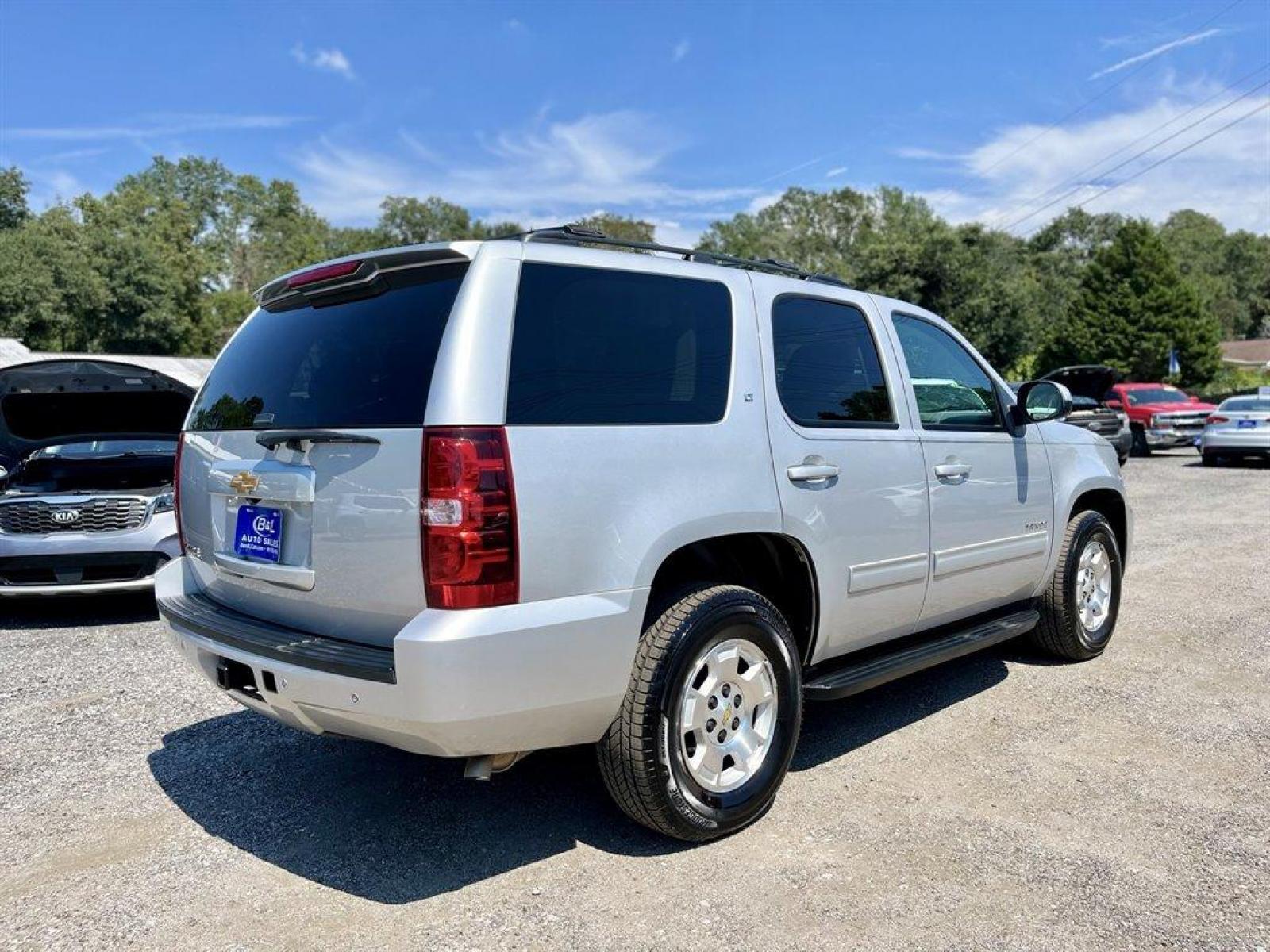 2014 Silver /Grey Chevrolet Tahoe (1GNSCBE01ER) with an 5.3l V8 SFI Flex 5.3l engine, Automatic transmission, located at 745 East Steele Rd., West Columbia, SC, 29170, (803) 755-9148, 33.927212, -81.148483 - Special Internet Price! 2014 Chevrolet Tahoe with AM/FM stereo, AUX port, SiriusXM Satellite Radio, Backup Camera, Cruise control, Leather interior, Powered front seats, Heated front seats, Second row 60/40 split-folding bench, third row 50/50 split-bench, Remote vehicle starter system, Remote Keyl - Photo #2