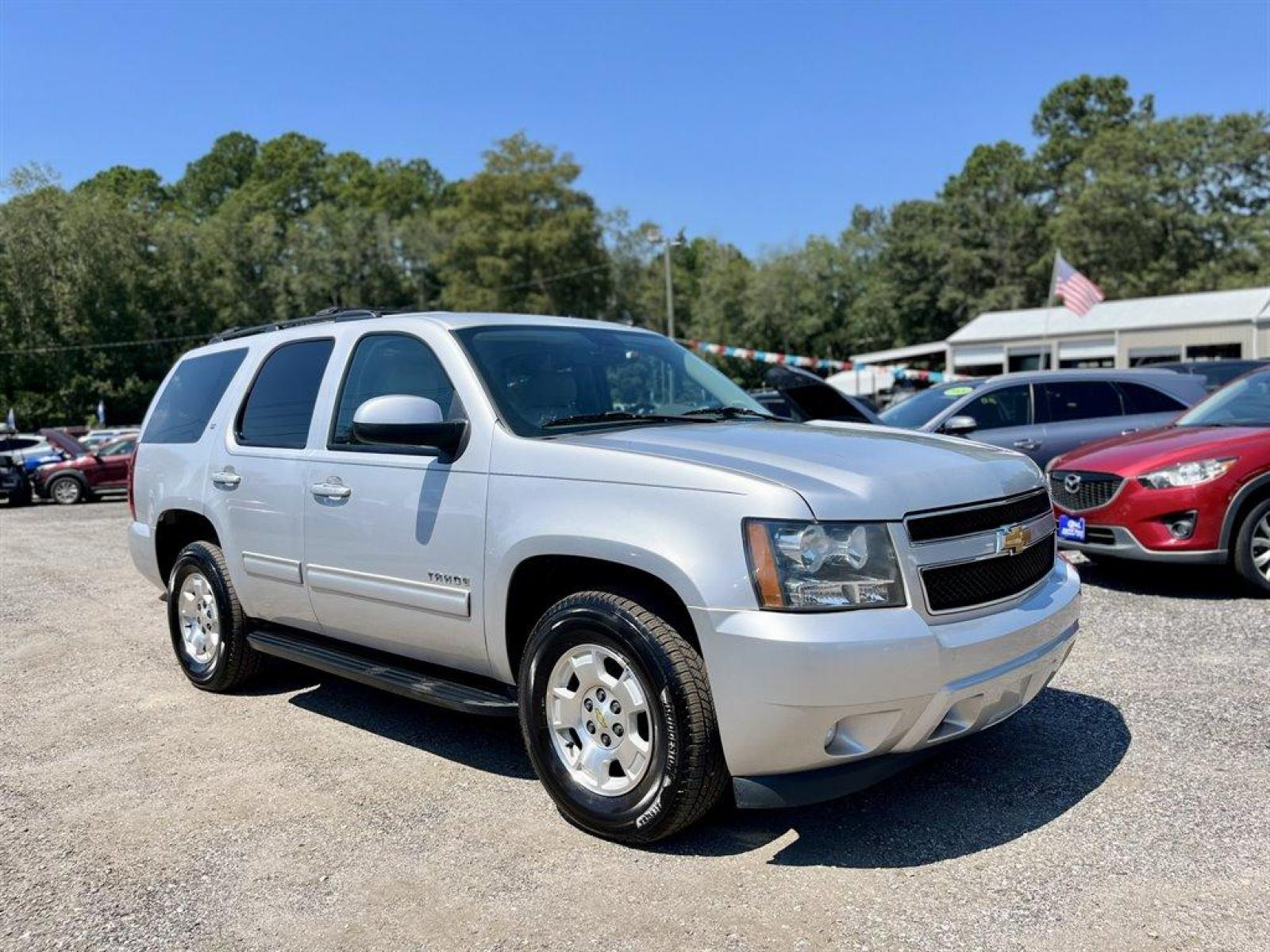 2014 Silver /Grey Chevrolet Tahoe (1GNSCBE01ER) with an 5.3l V8 SFI Flex 5.3l engine, Automatic transmission, located at 745 East Steele Rd., West Columbia, SC, 29170, (803) 755-9148, 33.927212, -81.148483 - Special Internet Price! 2014 Chevrolet Tahoe with AM/FM stereo, AUX port, SiriusXM Satellite Radio, Backup Camera, Cruise control, Leather interior, Powered front seats, Heated front seats, Second row 60/40 split-folding bench, third row 50/50 split-bench, Remote vehicle starter system, Remote Keyl - Photo #3