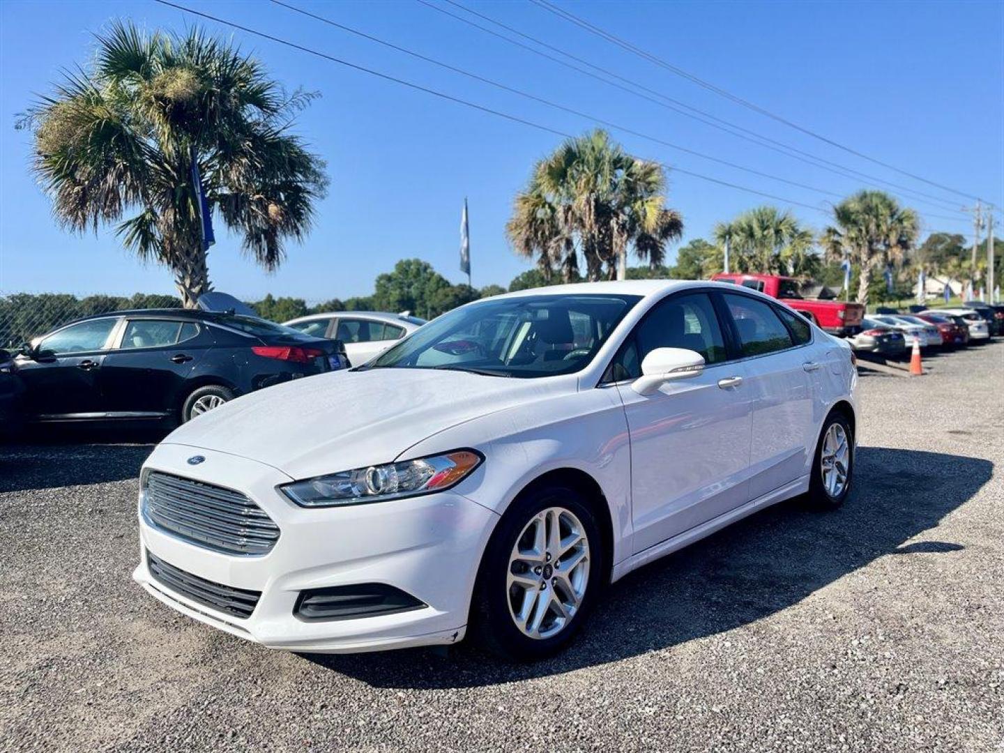 2015 White /Black Ford Fusion (3FA6P0H79FR) with an 2.5l I-4 Smpi Dohc 2.5l engine, Automatic transmission, located at 745 East Steele Rd., West Columbia, SC, 29170, (803) 755-9148, 33.927212, -81.148483 - Special Interent Price! 2015 Ford Fusion with AM/FM Stereo/MP3/Single-CD, Bluetooth, Manual Air Conditioning, Cruise Control, Remote Keyless Entry, Cloth interior, Rear 60-40 Folding Bench, Front powered seats, Plus more! - Photo#0