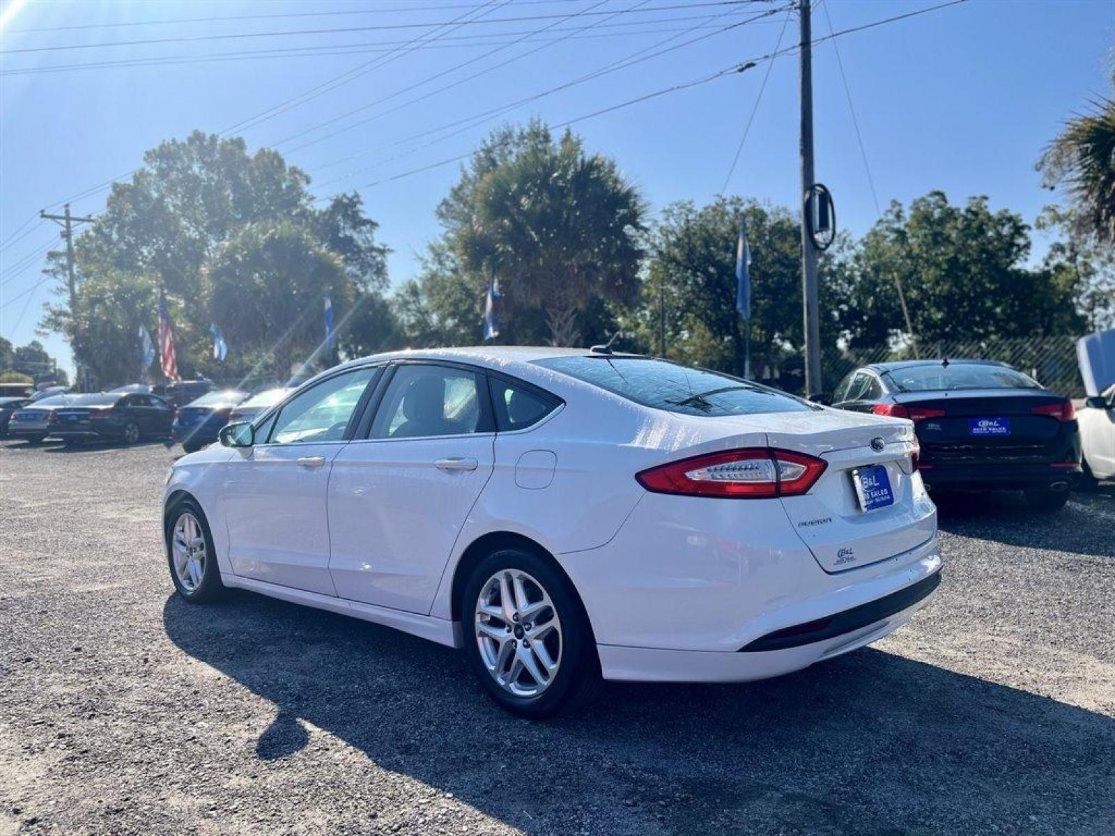 2015 White /Black Ford Fusion (3FA6P0H79FR) with an 2.5l I-4 Smpi Dohc 2.5l engine, Automatic transmission, located at 745 East Steele Rd., West Columbia, SC, 29170, (803) 755-9148, 33.927212, -81.148483 - Special Interent Price! 2015 Ford Fusion with AM/FM Stereo/MP3/Single-CD, Bluetooth, Manual Air Conditioning, Cruise Control, Remote Keyless Entry, Cloth interior, Rear 60-40 Folding Bench, Front powered seats, Plus more! - Photo #1