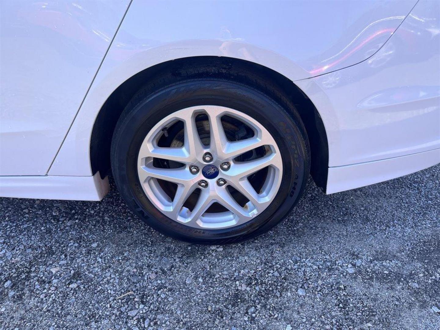 2015 White /Black Ford Fusion (3FA6P0H79FR) with an 2.5l I-4 Smpi Dohc 2.5l engine, Automatic transmission, located at 745 East Steele Rd., West Columbia, SC, 29170, (803) 755-9148, 33.927212, -81.148483 - Special Interent Price! 2015 Ford Fusion with AM/FM Stereo/MP3/Single-CD, Bluetooth, Manual Air Conditioning, Cruise Control, Remote Keyless Entry, Cloth interior, Rear 60-40 Folding Bench, Front powered seats, Plus more! - Photo#30