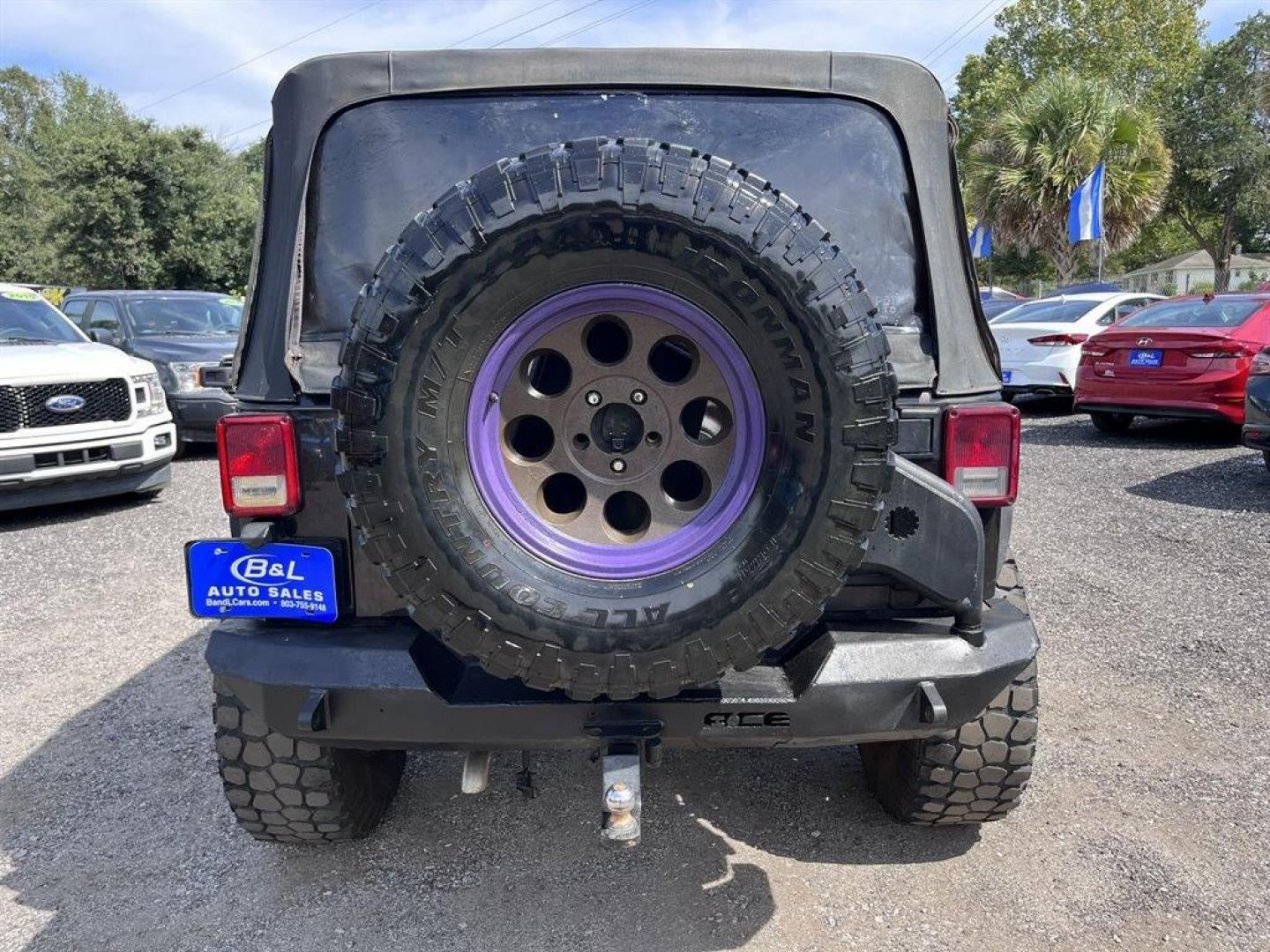 2013 Black /Black Jeep Wrangler (1C4BJWDG8DL) with an 3.6l V6 MPI Dohc 3.6l engine, Automatic transmission, located at 745 East Steele Rd., West Columbia, SC, 29170, (803) 755-9148, 33.927212, -81.148483 - Special Internet Price! 2013 Jeep Wrangler Unlimited Sport with AM/FM stereo, Bluetooth, Backup camera, Steering wheel mounted audio controls, Air conditioning, Sport bar with full padding, Light bar, Locking glove box, Plus more! - Photo#28