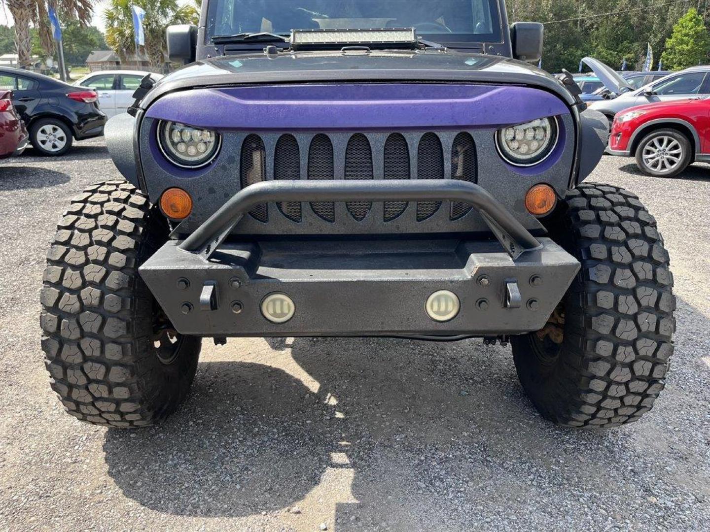 2013 Black /Black Jeep Wrangler (1C4BJWDG8DL) with an 3.6l V6 MPI Dohc 3.6l engine, Automatic transmission, located at 745 East Steele Rd., West Columbia, SC, 29170, (803) 755-9148, 33.927212, -81.148483 - Special Internet Price! 2013 Jeep Wrangler Unlimited Sport with AM/FM stereo, Bluetooth, Backup camera, Steering wheel mounted audio controls, Air conditioning, Sport bar with full padding, Light bar, Locking glove box, Plus more! - Photo#30