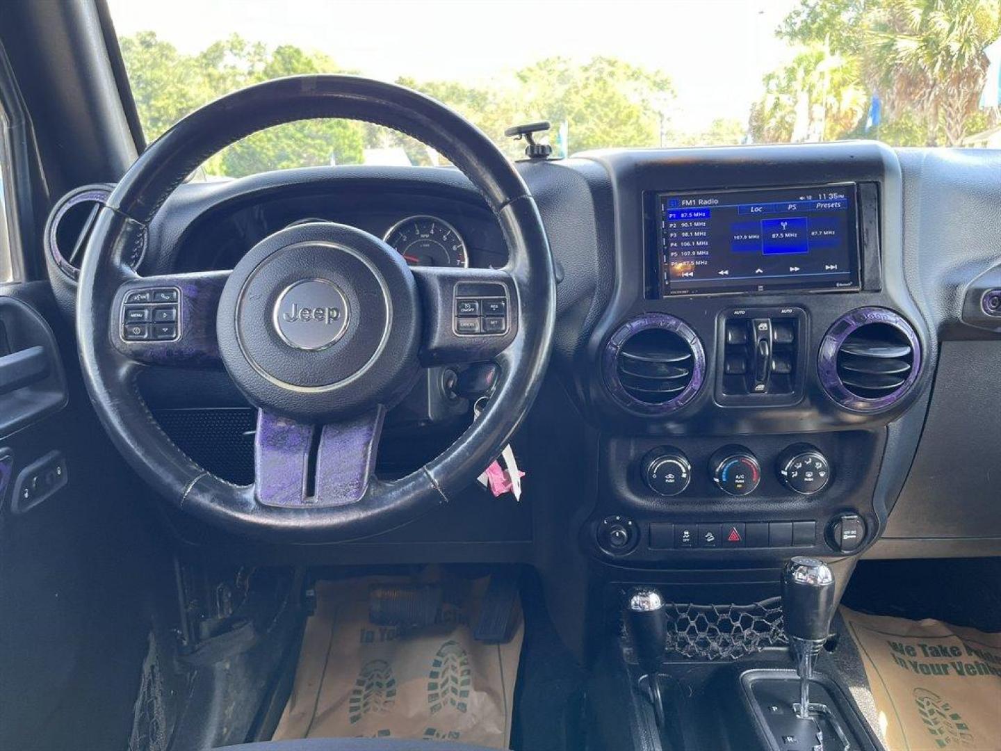 2013 Black /Black Jeep Wrangler (1C4BJWDG8DL) with an 3.6l V6 MPI Dohc 3.6l engine, Automatic transmission, located at 745 East Steele Rd., West Columbia, SC, 29170, (803) 755-9148, 33.927212, -81.148483 - Special Internet Price! 2013 Jeep Wrangler Unlimited Sport with AM/FM stereo, Bluetooth, Backup camera, Steering wheel mounted audio controls, Air conditioning, Sport bar with full padding, Light bar, Locking glove box, Plus more! - Photo#4