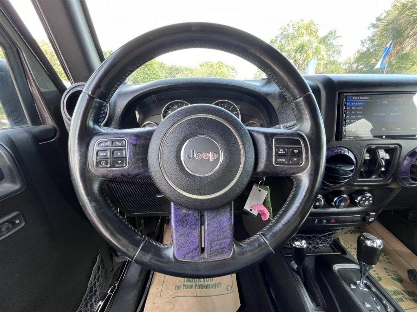 2013 Black /Black Jeep Wrangler (1C4BJWDG8DL) with an 3.6l V6 MPI Dohc 3.6l engine, Automatic transmission, located at 745 East Steele Rd., West Columbia, SC, 29170, (803) 755-9148, 33.927212, -81.148483 - Special Internet Price! 2013 Jeep Wrangler Unlimited Sport with AM/FM stereo, Bluetooth, Backup camera, Steering wheel mounted audio controls, Air conditioning, Sport bar with full padding, Light bar, Locking glove box, Plus more! - Photo#5