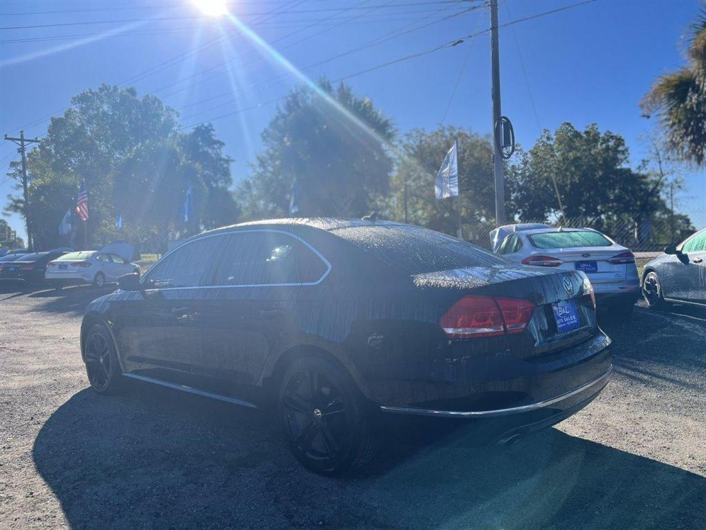 2015 Black /Tan Volkswagen Passat (1VWCS7A34FC) with an 1.8l I-4 DI Dohc T/C 1.8l engine, Automatic transmission, located at 745 East Steele Rd., West Columbia, SC, 29170, (803) 755-9148, 33.927212, -81.148483 - Special Internet Price! 2015 Volkswagen Passat SEL with Bluetooth, Backup camera, Navigation, Sunroof, Cruise Control, Remote Keyless Entry, Powered memory driver seat, Rear 60-40 Folding Bench, Plus more! - Photo#1