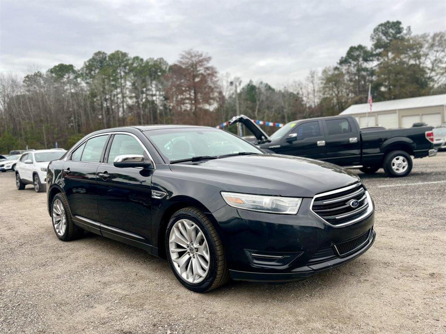 2013 Black /Black Ford Taurus (1FAHP2F80DG) with an 3.5l V6 Smpi TI-VCT 3.5l engine, Automatic transmission, located at 745 East Steele Rd., West Columbia, SC, 29170, (803) 755-9148, 33.927212, -81.148483 - Special Internet Price! 2013 Ford Taurus Limited with Bluetooth, AM/FM stereo, Cruise control, Backup camera, Remote keyless entry, Dual-zone air conditioning, Leather interior, Powered driver seat, Rear 60/40 split fold-flat, Powered windows, Powered door locks, Plus more! - Photo#3