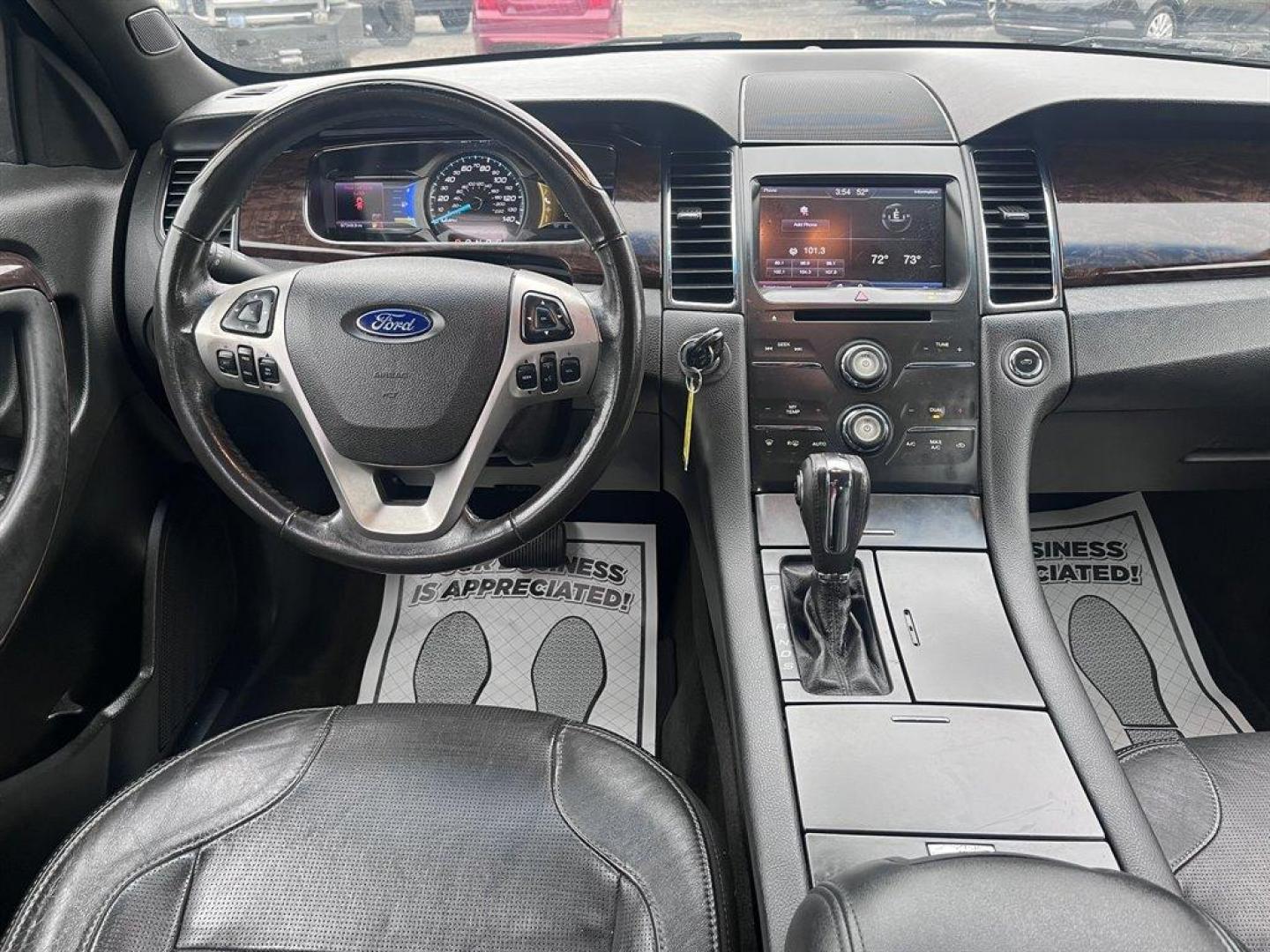 2013 Black /Black Ford Taurus (1FAHP2F80DG) with an 3.5l V6 Smpi TI-VCT 3.5l engine, Automatic transmission, located at 745 East Steele Rd., West Columbia, SC, 29170, (803) 755-9148, 33.927212, -81.148483 - Special Internet Price! 2013 Ford Taurus Limited with Bluetooth, AM/FM stereo, Cruise control, Backup camera, Remote keyless entry, Dual-zone air conditioning, Leather interior, Powered driver seat, Rear 60/40 split fold-flat, Powered windows, Powered door locks, Plus more! - Photo#4