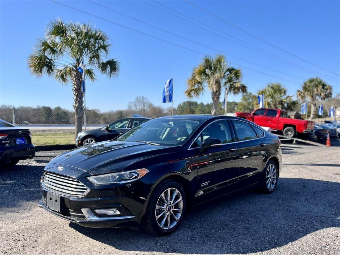 2017 Black /Black Ford Fusion (3FA6P0PU5HR) with an 2.0l I-4 Smpi Dohc Phev 2 engine, Automatic transmission, located at 745 East Steele Rd., West Columbia, SC, 29170, (803) 755-9148, 33.927212, -81.148483 - Special Internet Price! 2017 Ford Fusion SE Luxury Energi with Bluetooth, Backup Camera, Cruise Control, Keyless Entry, Push To Start, Leather Interior, Heated Front Seats, Powered Driver Seat, 60/40 Split Rear Bench Seat, Powered Windows, Powered Door Locks, Plus More! - Photo#0