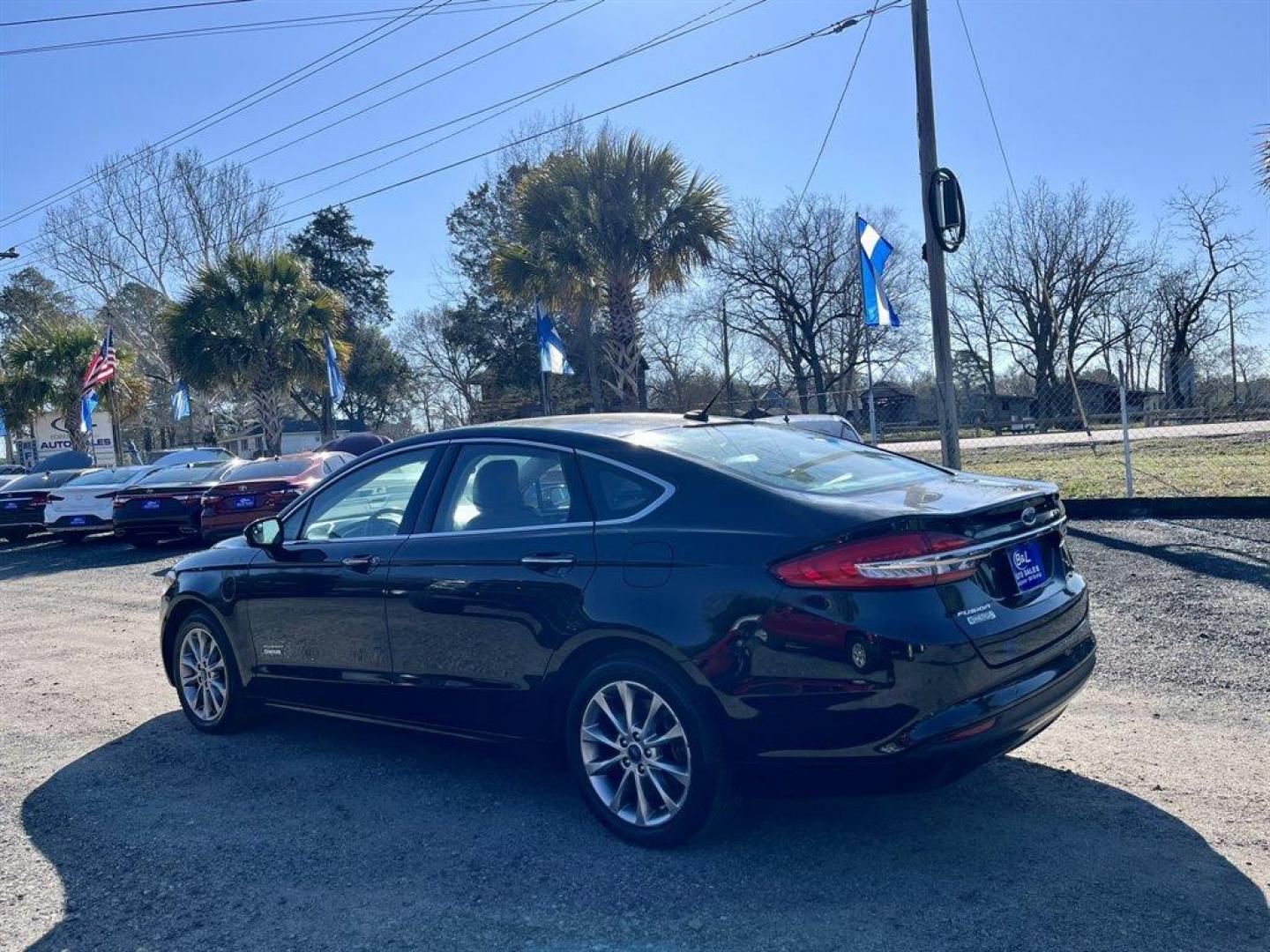 2017 Black /Black Ford Fusion (3FA6P0PU5HR) with an 2.0l I-4 Smpi Dohc Phev 2 engine, Automatic transmission, located at 745 East Steele Rd., West Columbia, SC, 29170, (803) 755-9148, 33.927212, -81.148483 - Special Internet Price! 2017 Ford Fusion SE Luxury Energi with Bluetooth, Backup Camera, Cruise Control, Keyless Entry, Push To Start, Leather Interior, Heated Front Seats, Powered Driver Seat, 60/40 Split Rear Bench Seat, Powered Windows, Powered Door Locks, Plus More! - Photo#1