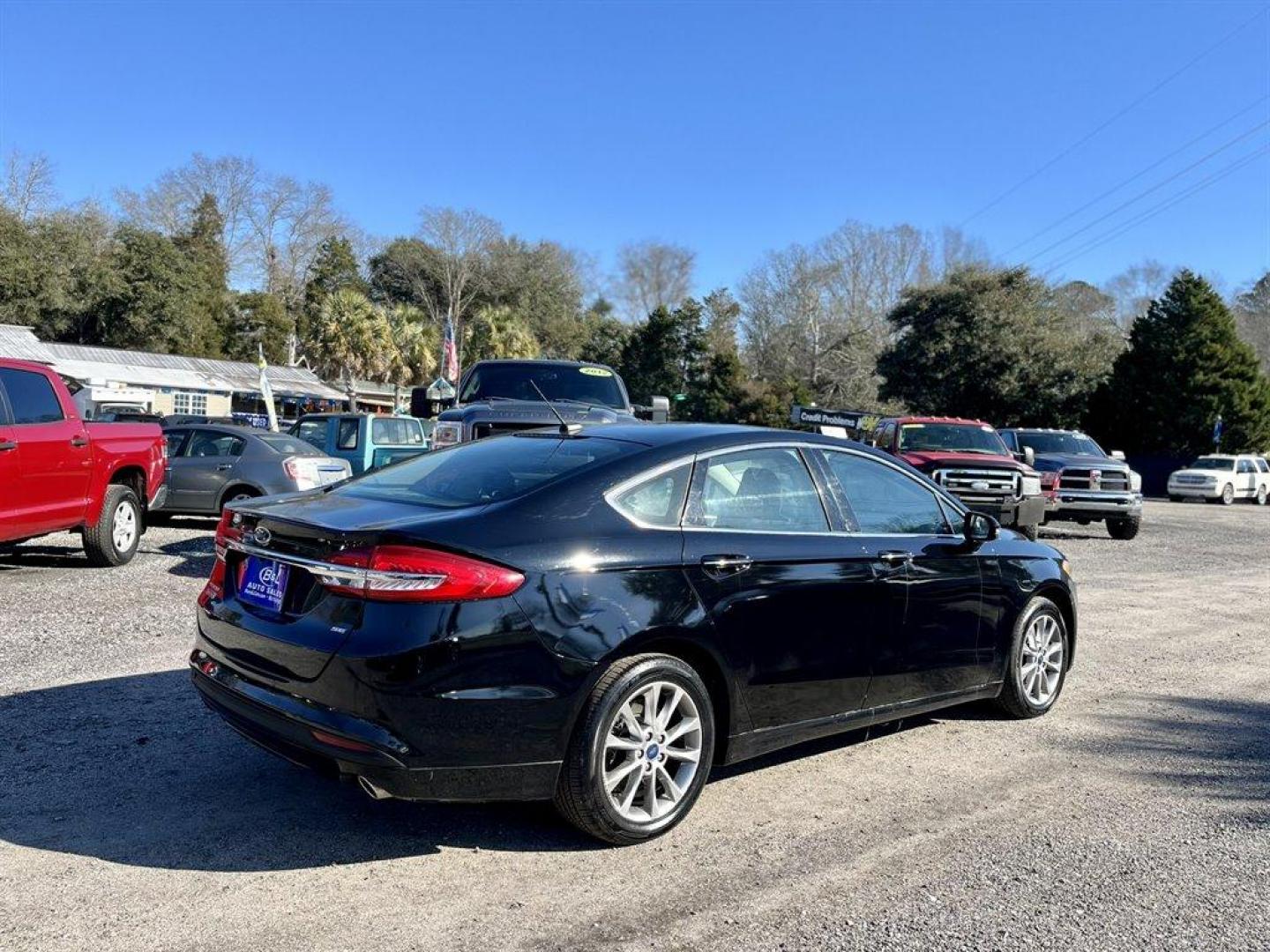 2017 Black /Black Ford Fusion (3FA6P0PU5HR) with an 2.0l I-4 Smpi Dohc Phev 2 engine, Automatic transmission, located at 745 East Steele Rd., West Columbia, SC, 29170, (803) 755-9148, 33.927212, -81.148483 - Special Internet Price! 2017 Ford Fusion SE Luxury Energi with Bluetooth, Backup Camera, Cruise Control, Keyless Entry, Push To Start, Leather Interior, Heated Front Seats, Powered Driver Seat, 60/40 Split Rear Bench Seat, Powered Windows, Powered Door Locks, Plus More! - Photo#2